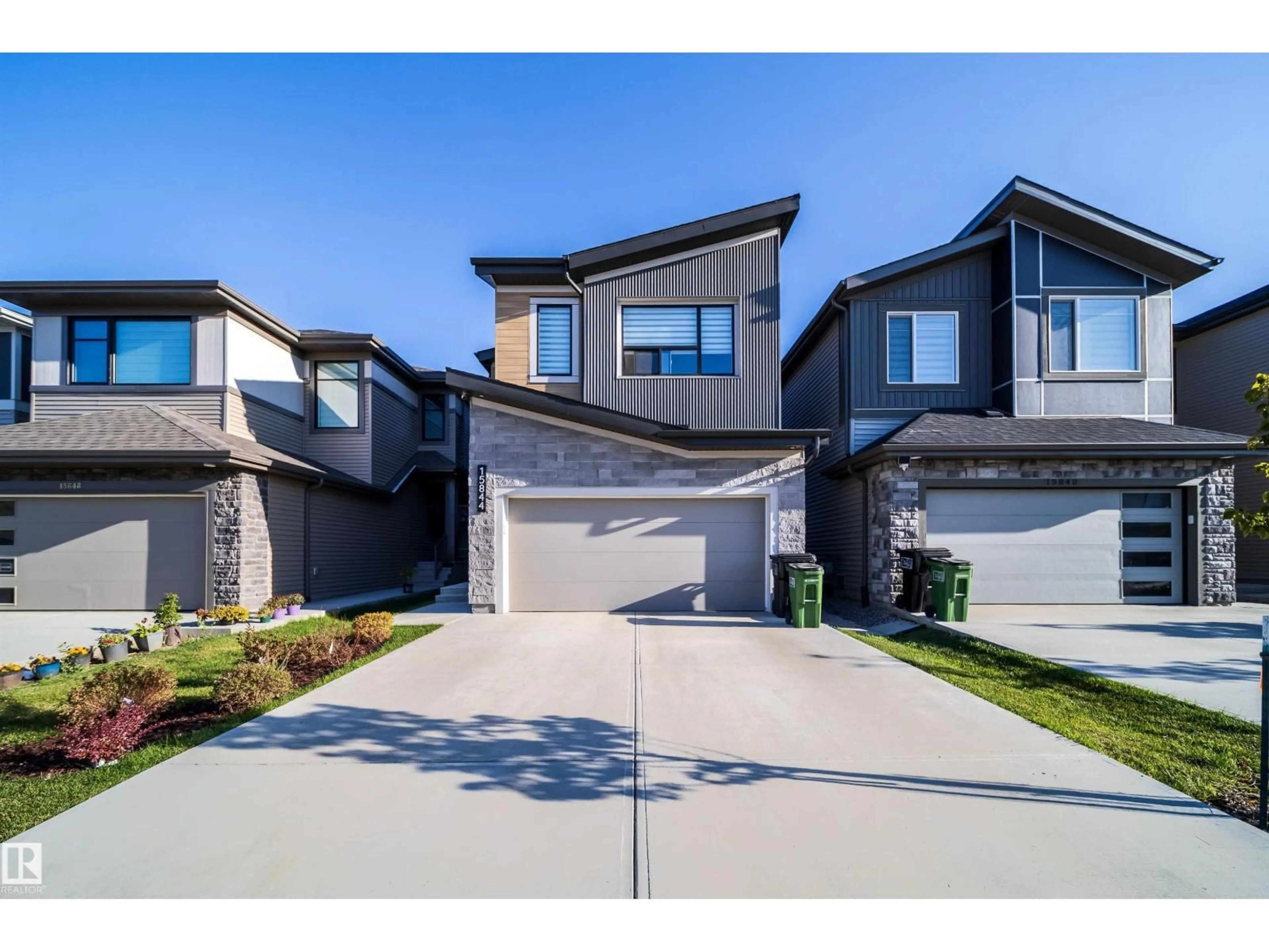 A pic from outside/outdoor area/front of a property/back of a property/a pic from drone, street for SW - 15844 25 AV, Edmonton Alberta T6W5K4