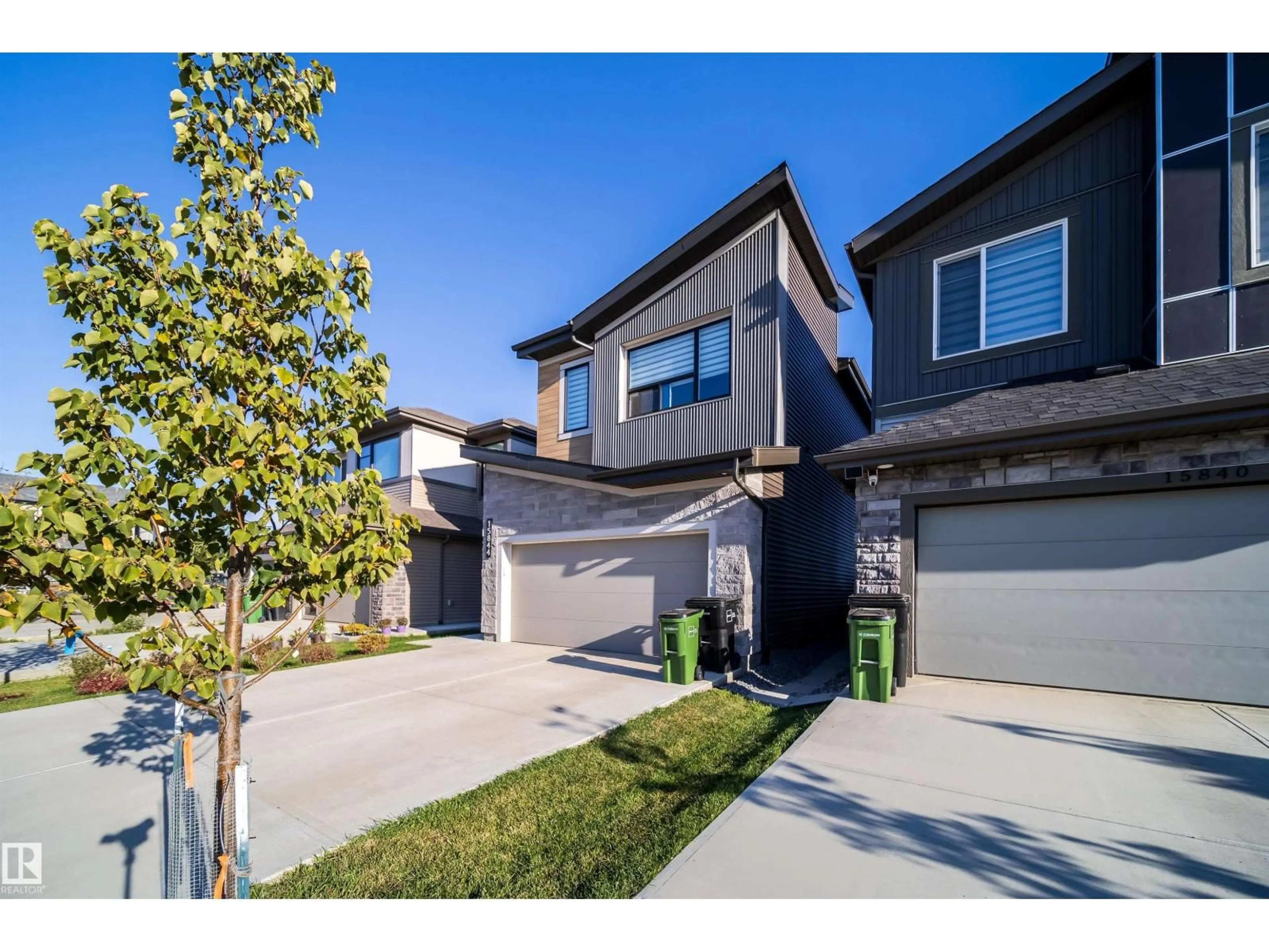 A pic from outside/outdoor area/front of a property/back of a property/a pic from drone, street for SW - 15844 25 AV, Edmonton Alberta T6W5K4