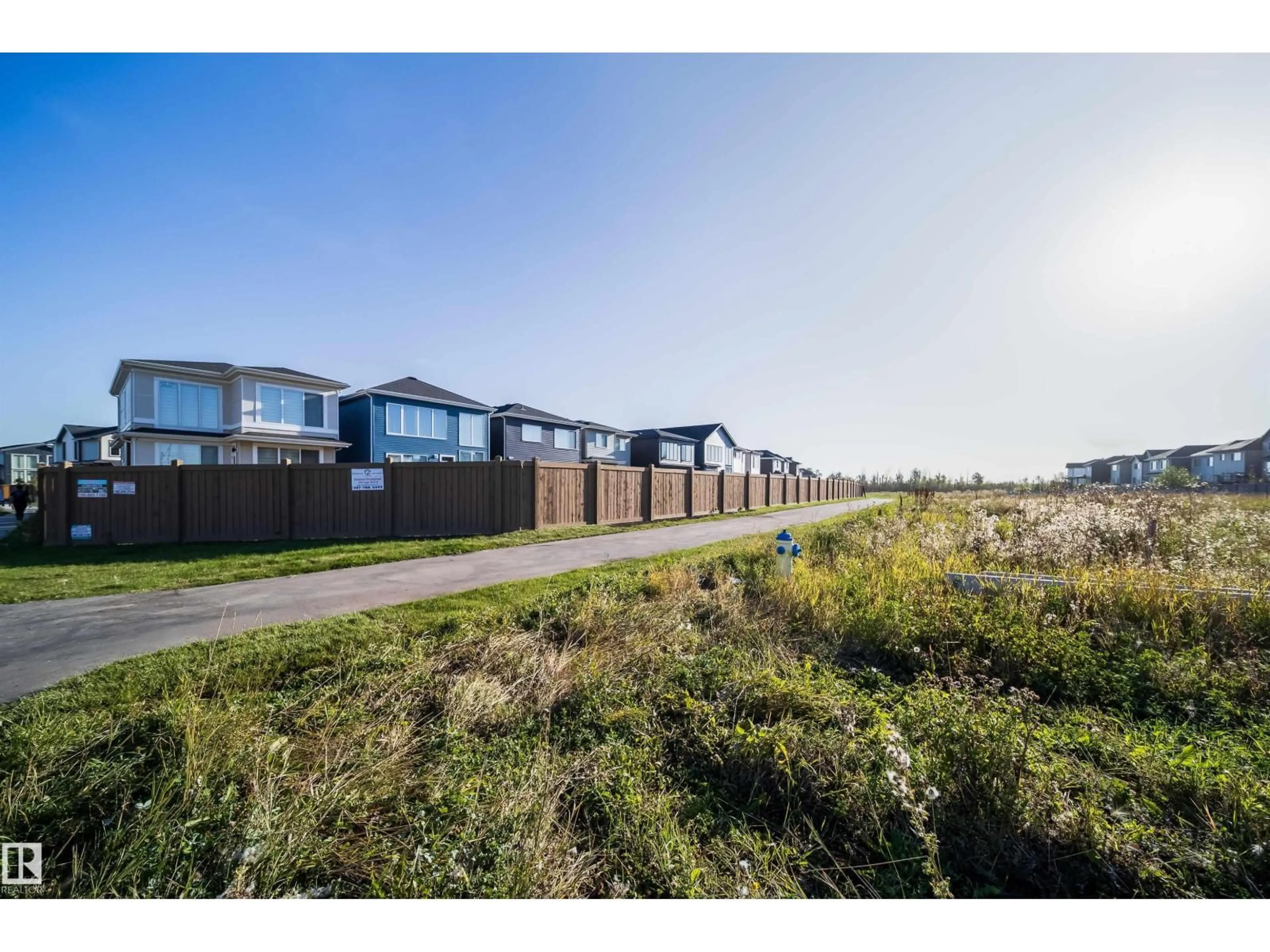 A pic from outside/outdoor area/front of a property/back of a property/a pic from drone, street for SW - 15844 25 AV, Edmonton Alberta T6W5K4