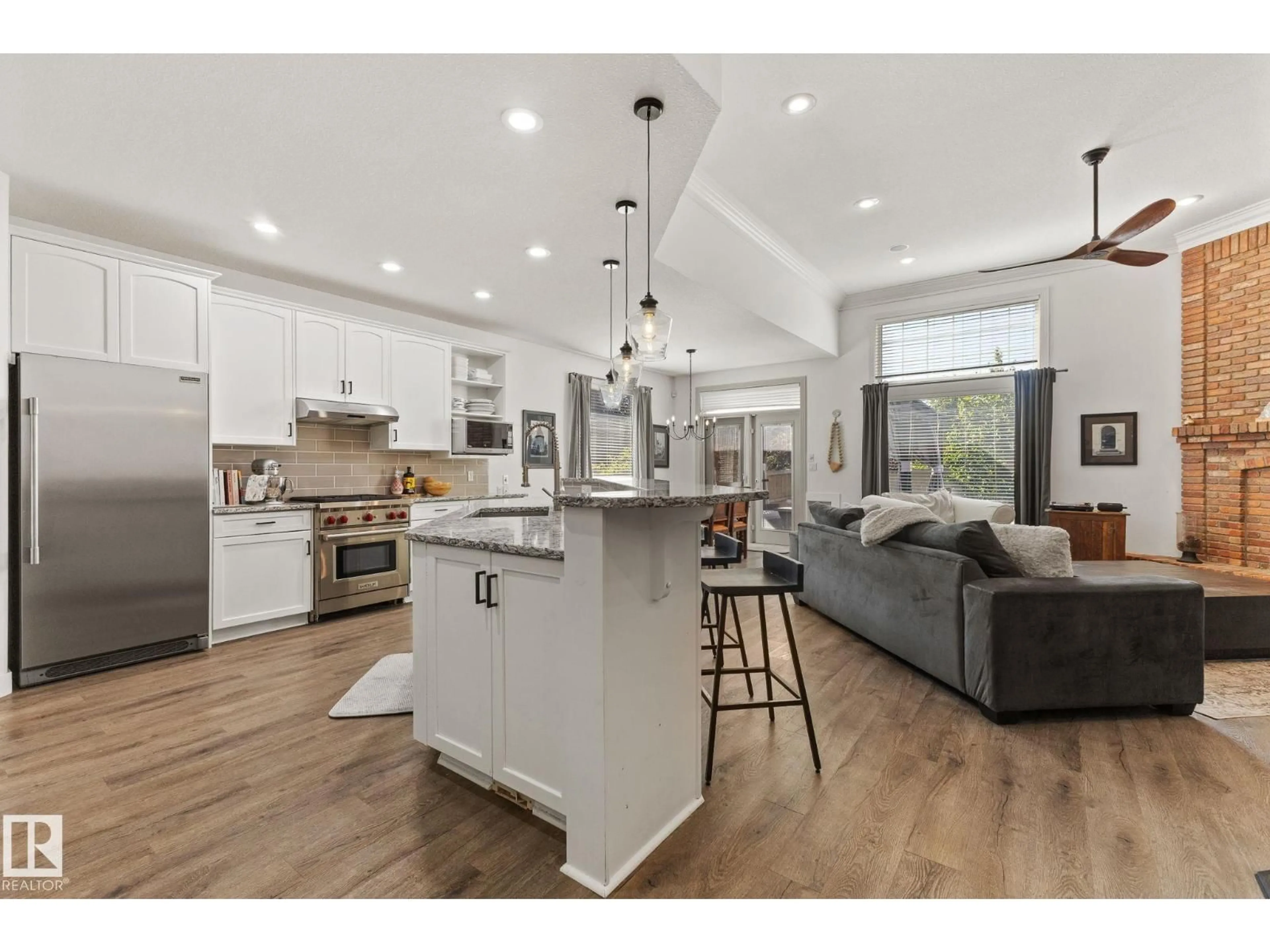 Open concept kitchen, wood/laminate floor for 17 RIDGEROCK PT, Sherwood Park Alberta T8A6G5
