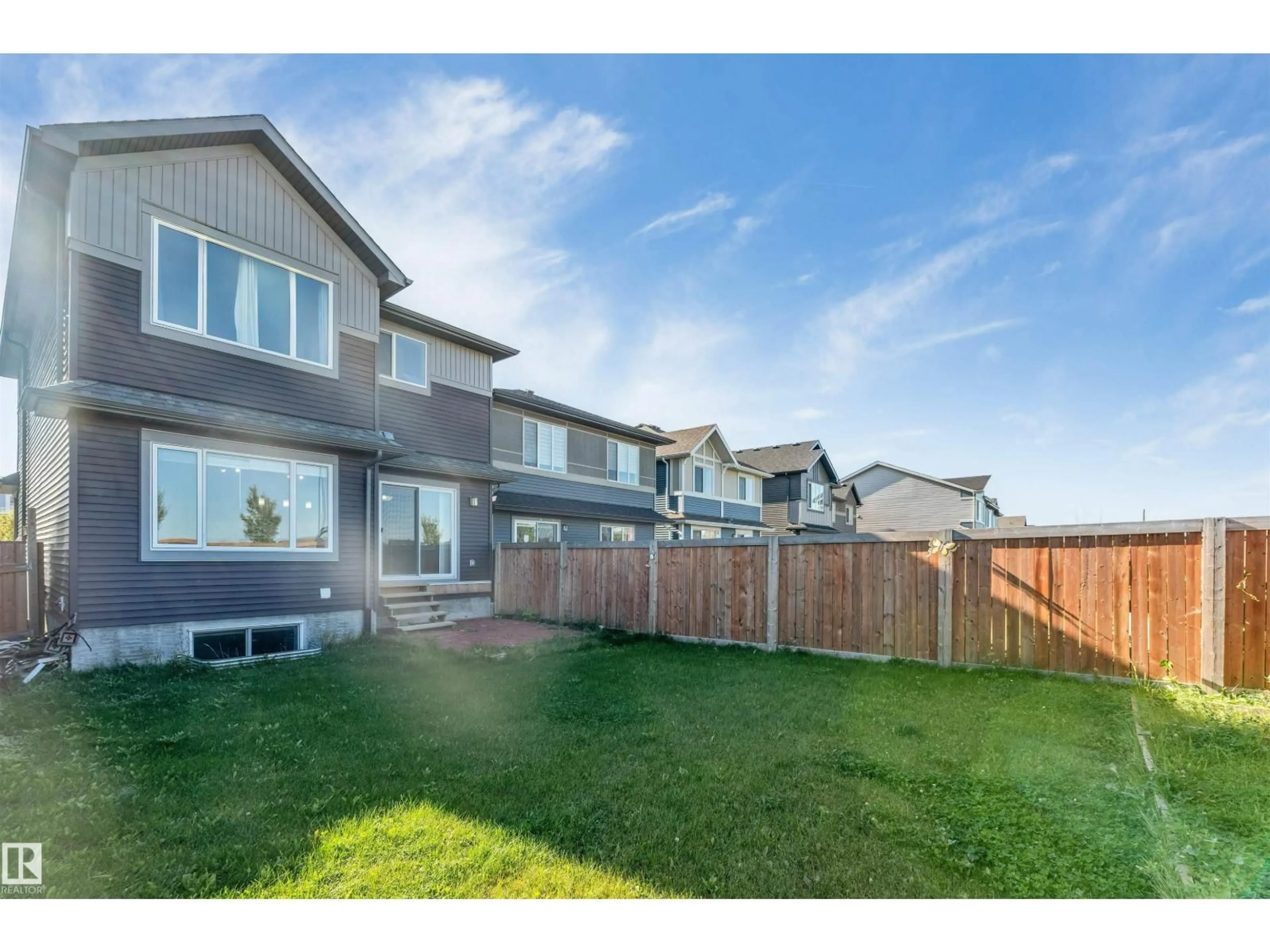 A pic from outside/outdoor area/front of a property/back of a property/a pic from drone, mountain view for SW - 2743 COLLINS CR, Edmonton Alberta T6W3X4