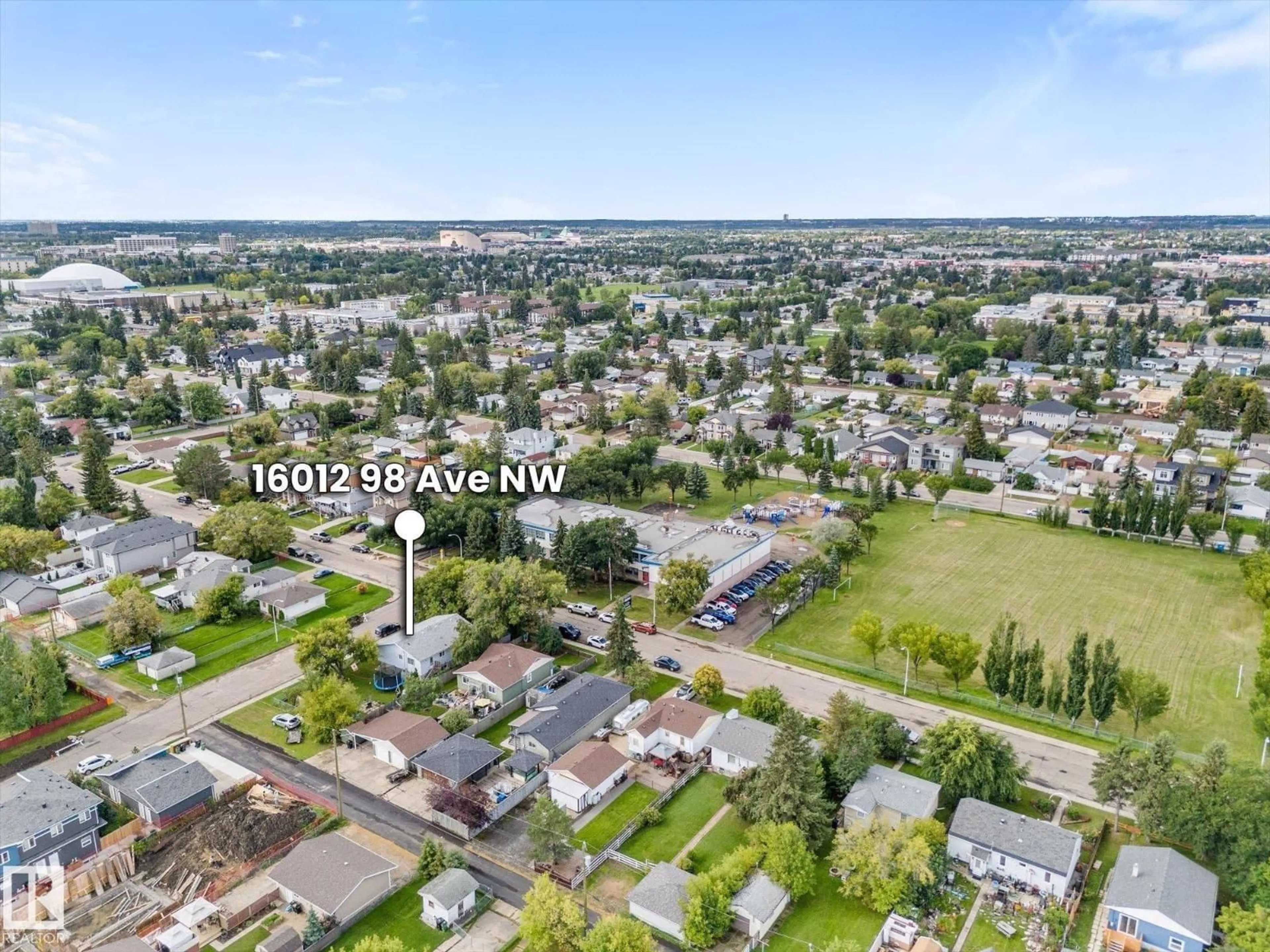 A pic from outside/outdoor area/front of a property/back of a property/a pic from drone, unknown for NW - 16012 98 AV, Edmonton Alberta T5P4W9