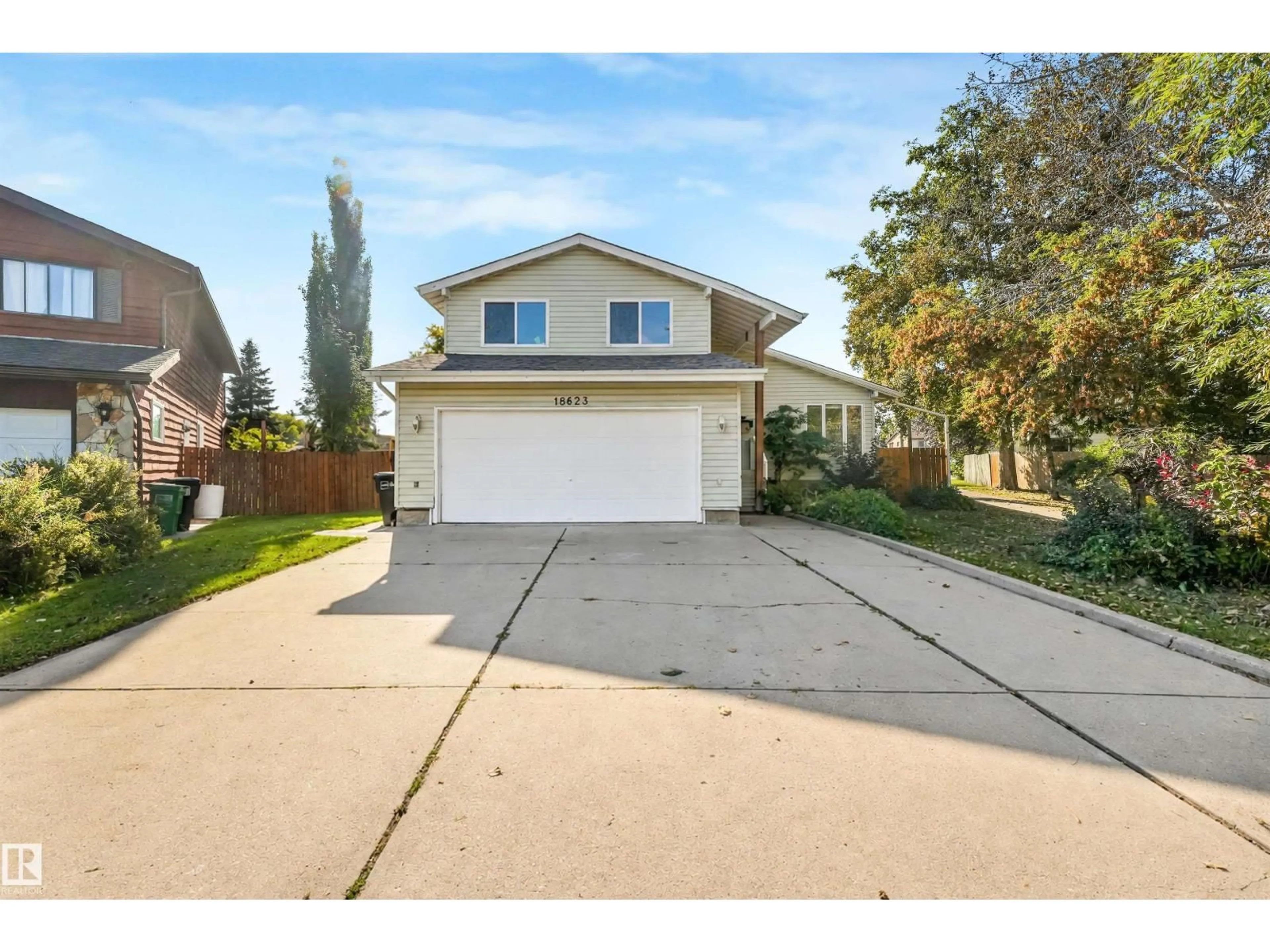 Home with vinyl exterior material, street for 18623 70 AV, Edmonton Alberta T5T3A6