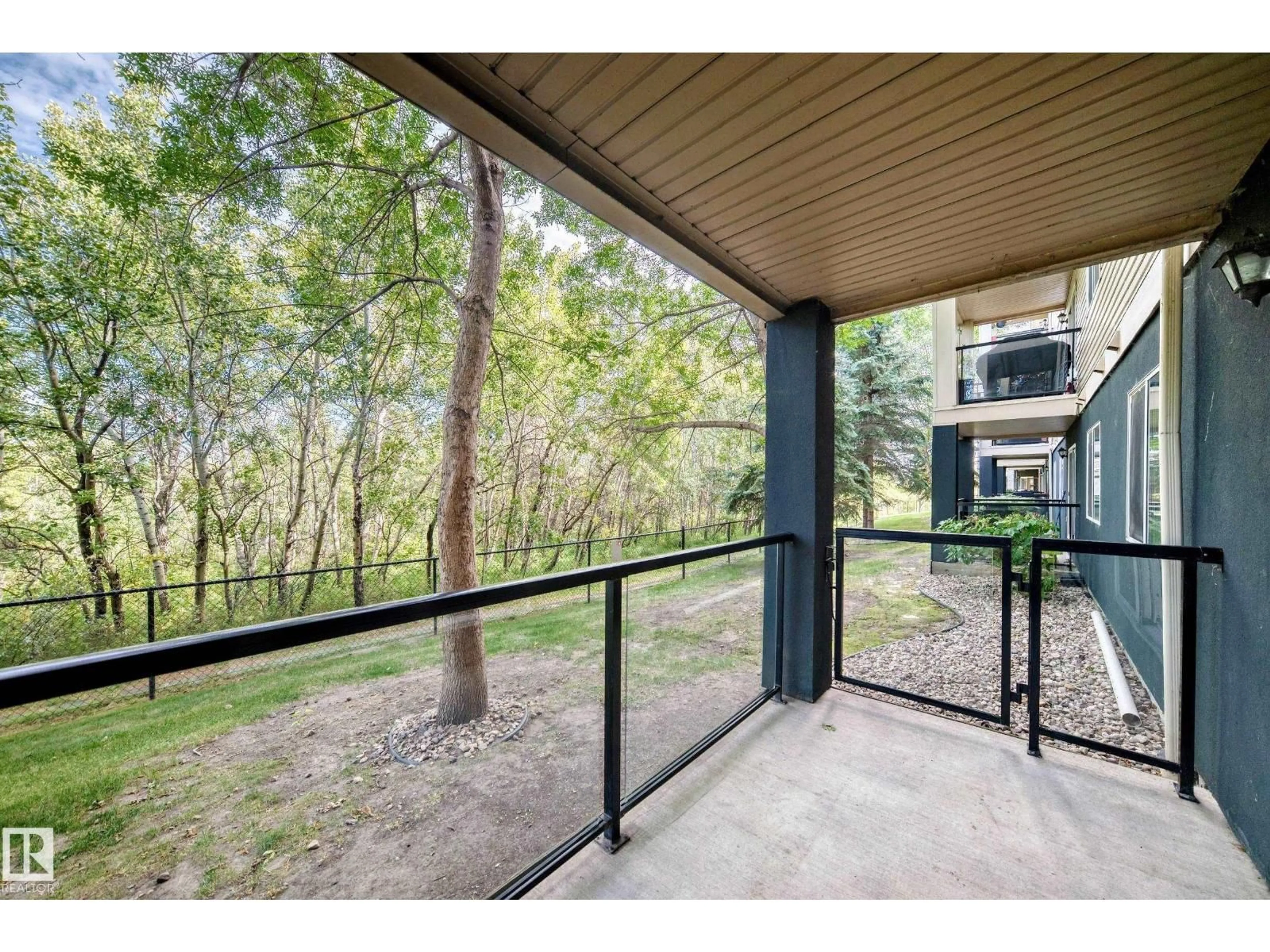 Patio, forest/trees view for 127 HOOKE RD NW, Edmonton Alberta T5A5H2