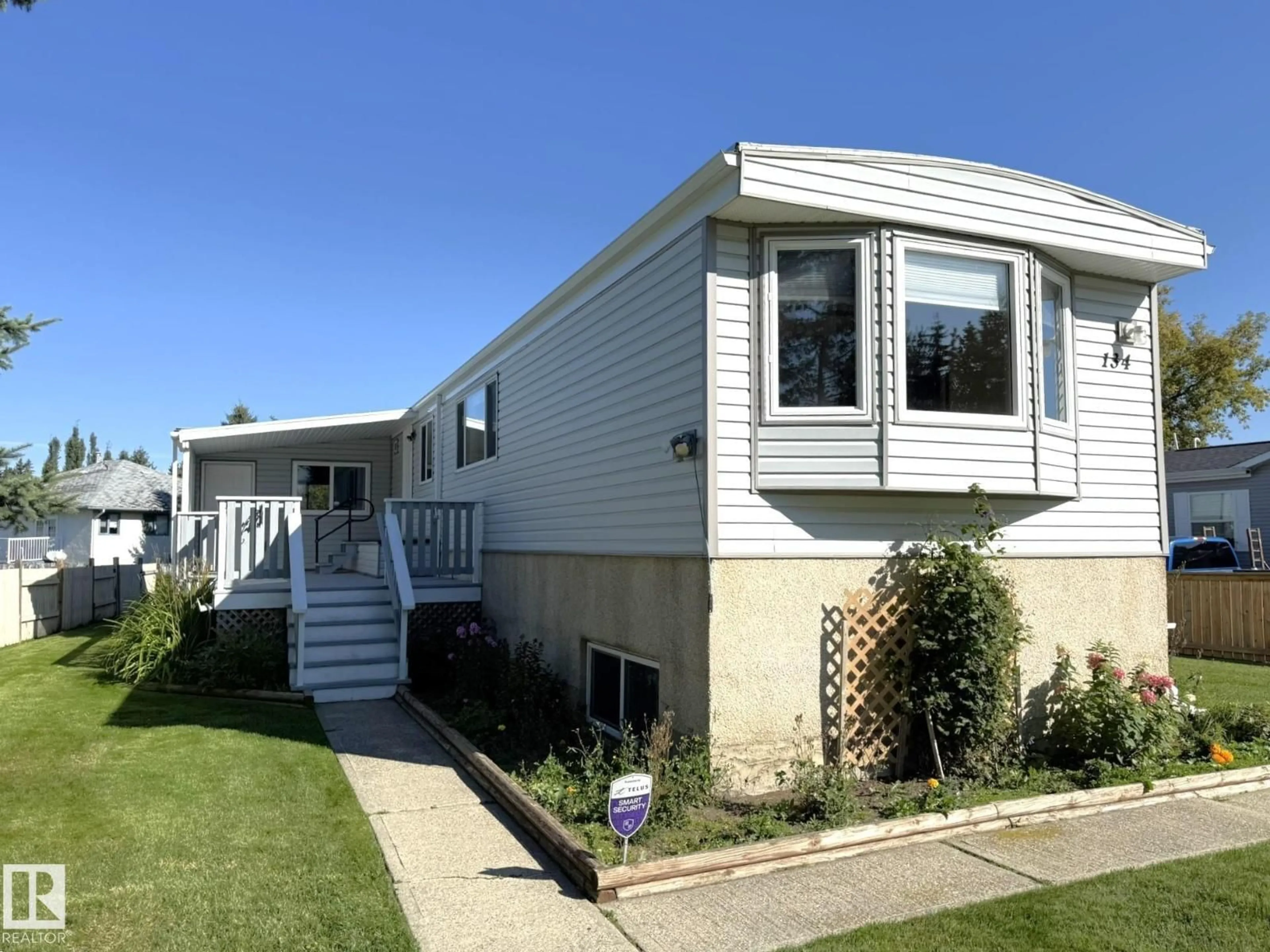 Home with vinyl exterior material, street for 134 WILLOW DR, Breton Alberta T0C0P0