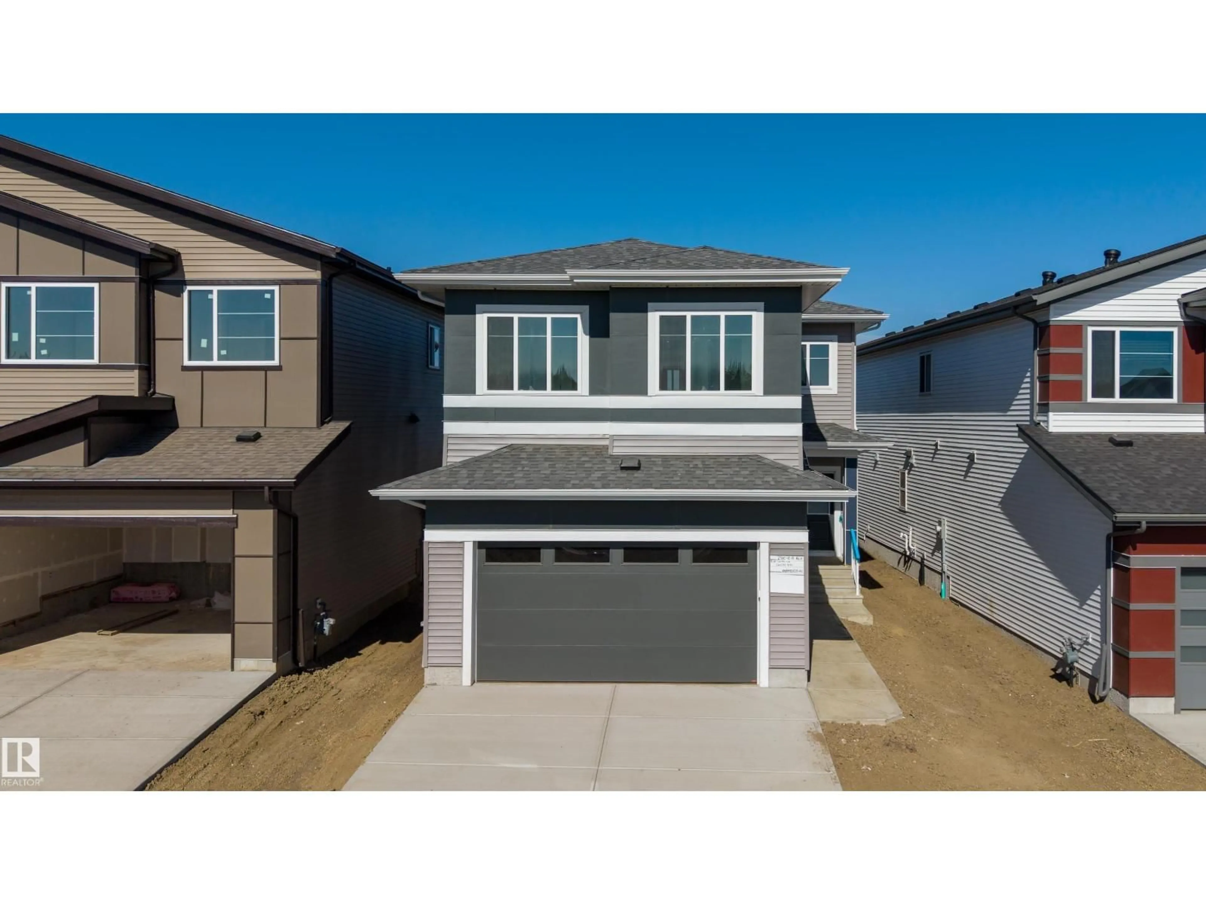 A pic from outside/outdoor area/front of a property/back of a property/a pic from drone, street for 2310 6A AV, Edmonton Alberta T6X3P4