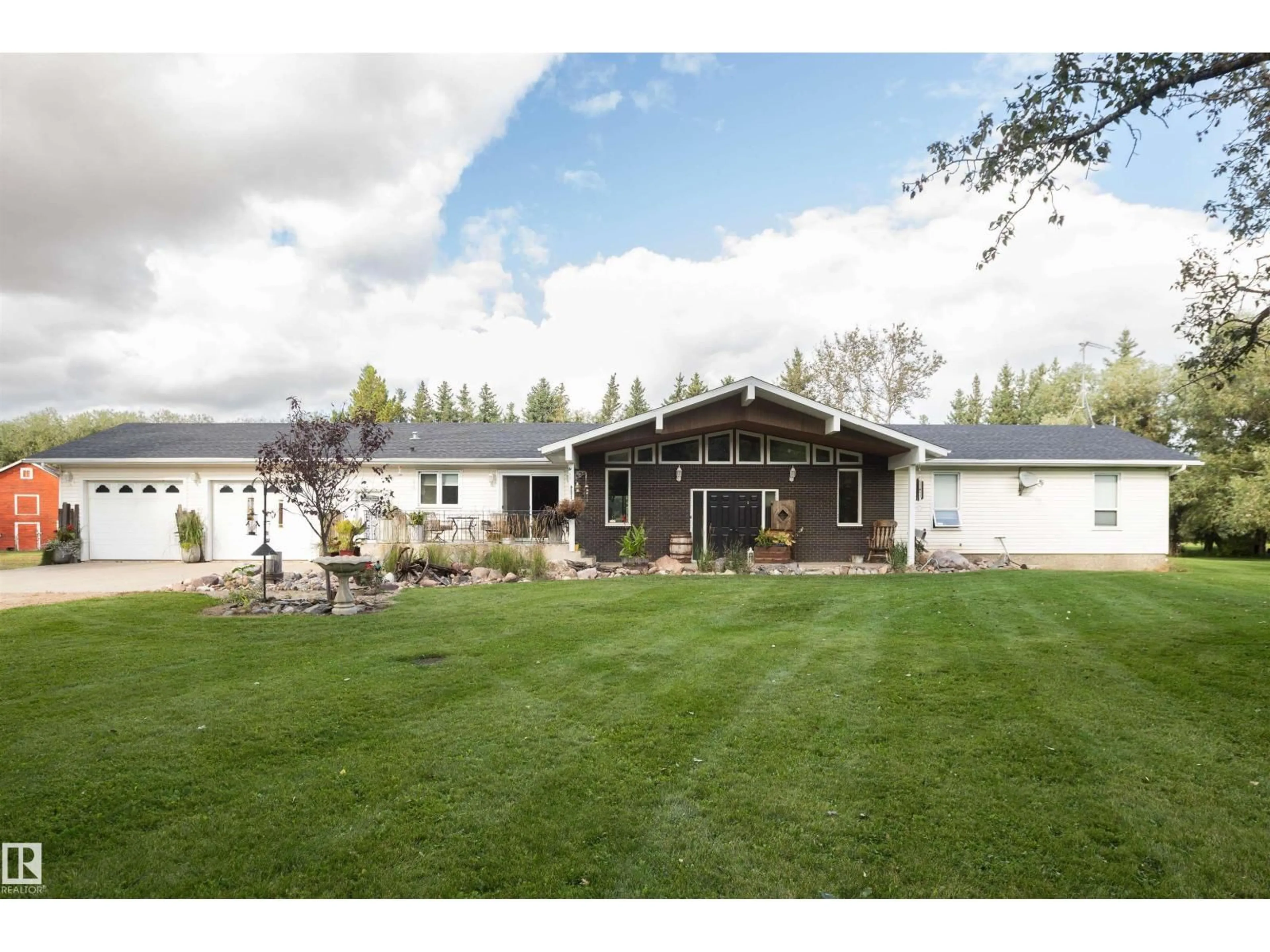 A pic from outside/outdoor area/front of a property/back of a property/a pic from drone, mountain view for 26312 TWP 604, Rural Westlock County Alberta T7P2P7