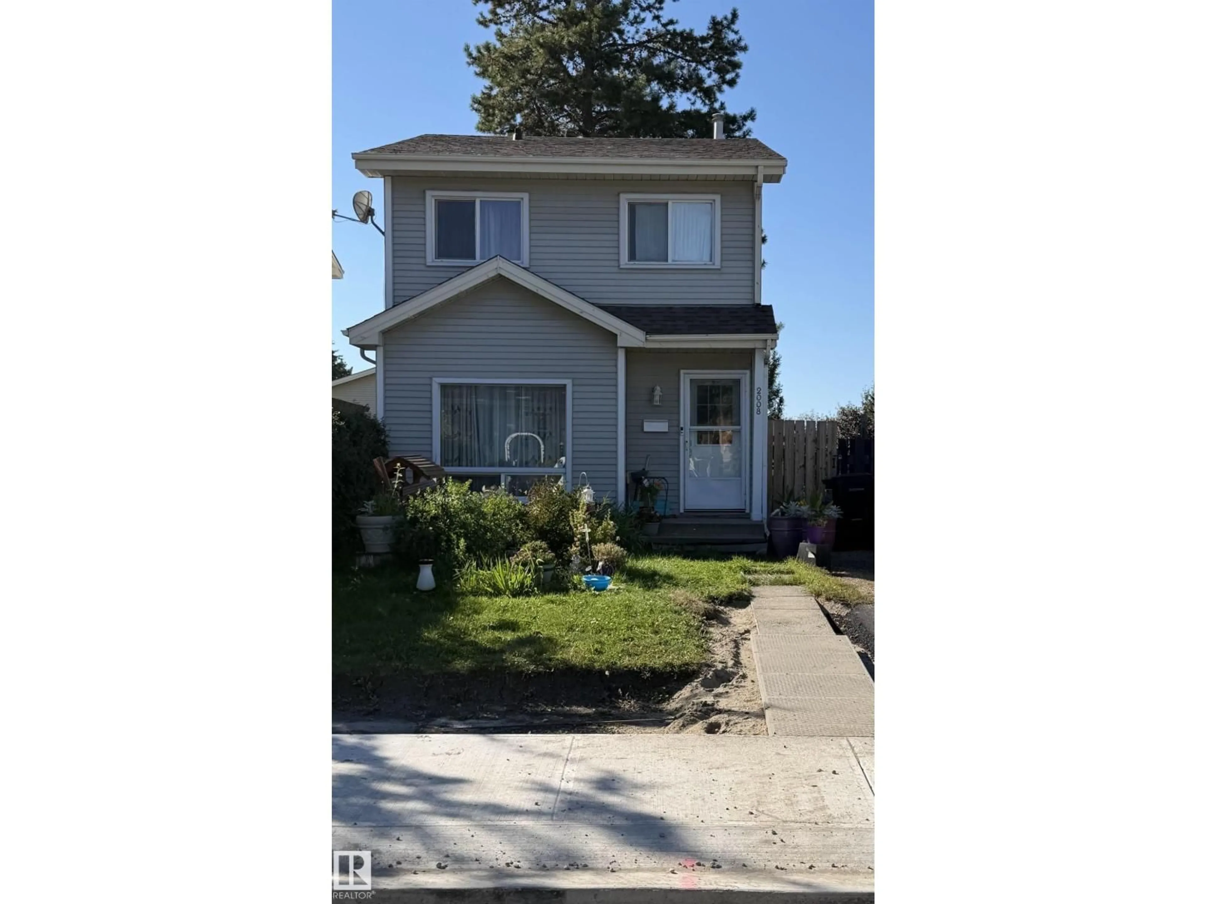 Home with vinyl exterior material, street for 2008 53 ST, Edmonton Alberta T6L5G4
