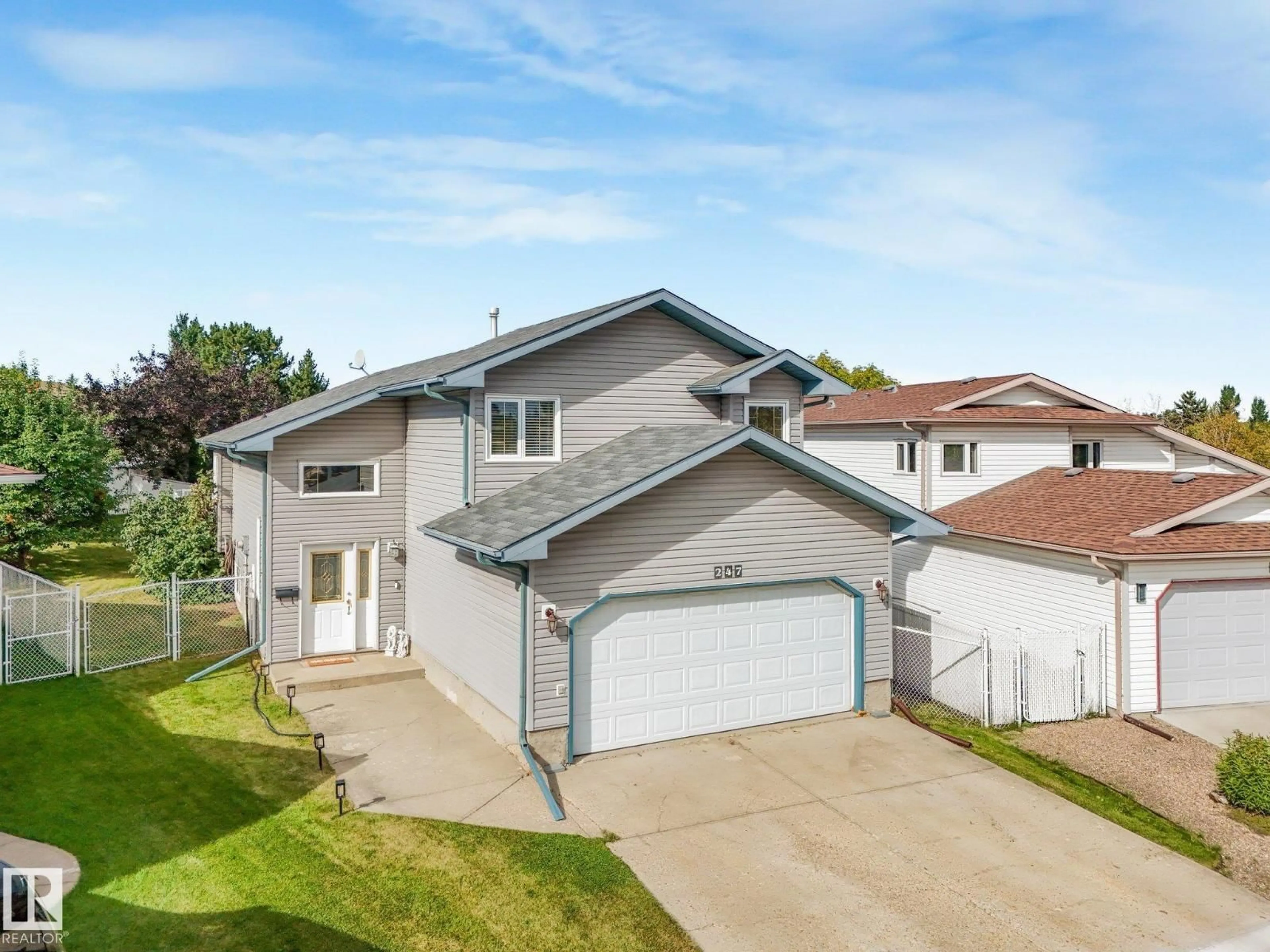 A pic from outside/outdoor area/front of a property/back of a property/a pic from drone, street for 247 HOOPER CR, Edmonton Alberta T5A4Z1
