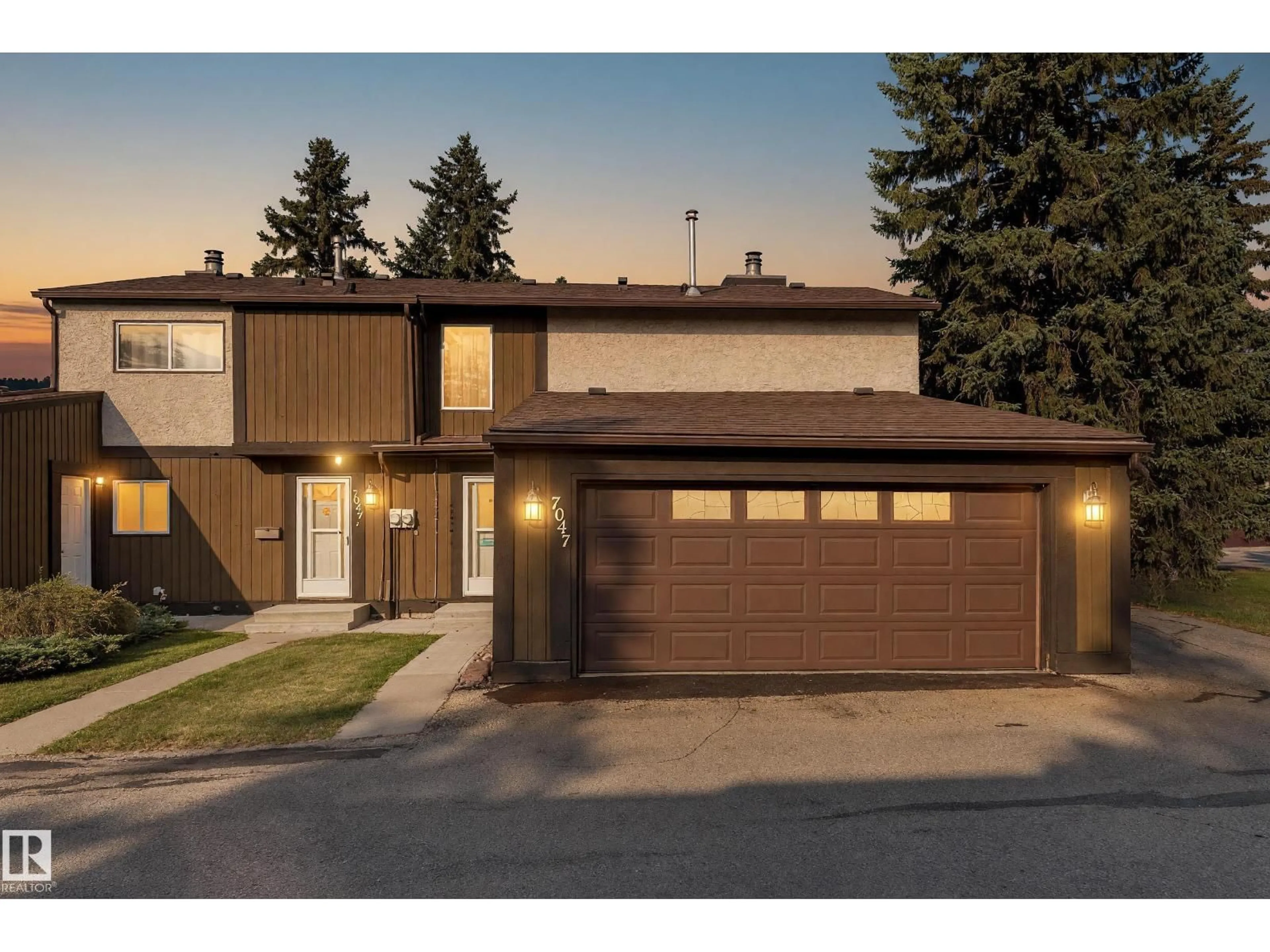 Home with brick exterior material, street for 7047 32 AV, Edmonton Alberta T6K2K9