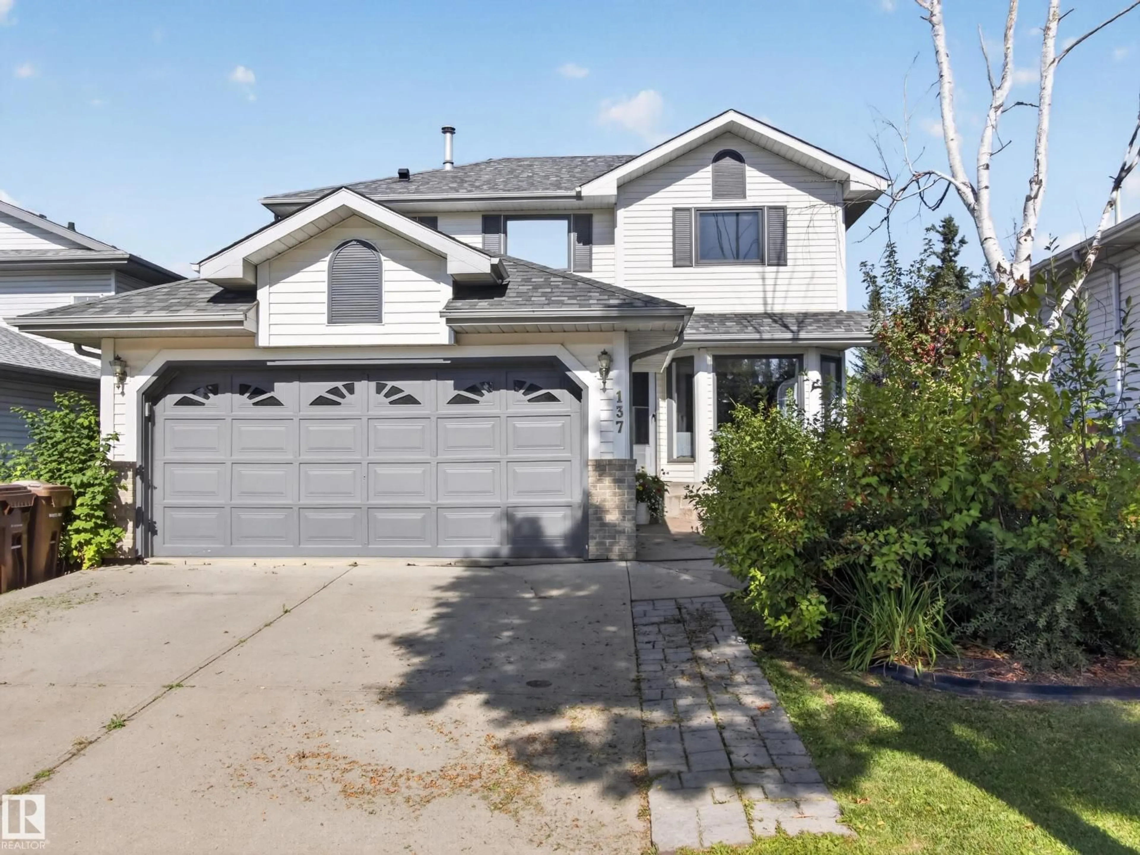 Home with vinyl exterior material, street for 137 DEER RIDGE DR, St. Albert Alberta T8N6G7