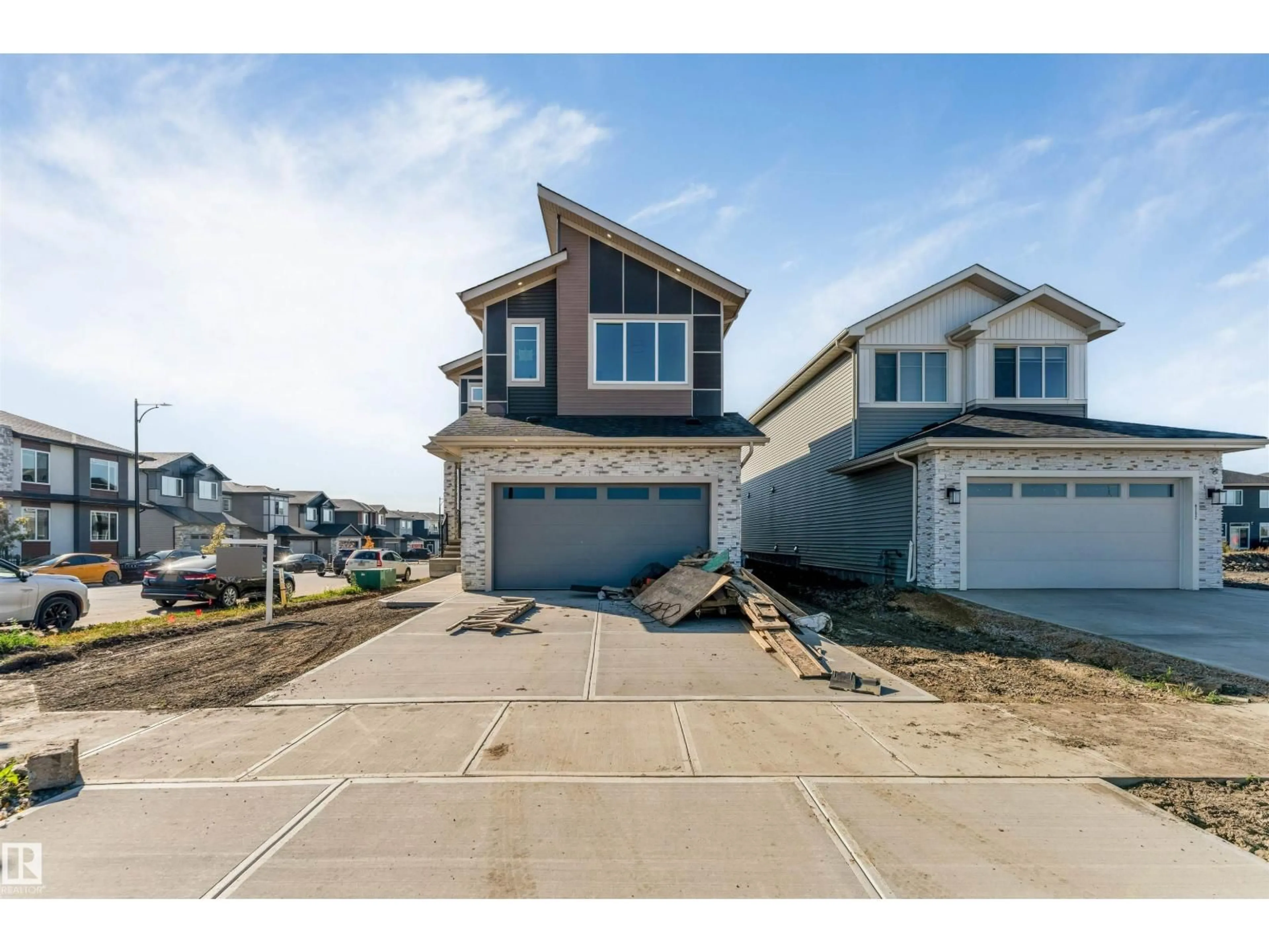 Home with vinyl exterior material, street for NE - 6298 19 ST, Rural Leduc County Alberta T4X3C9