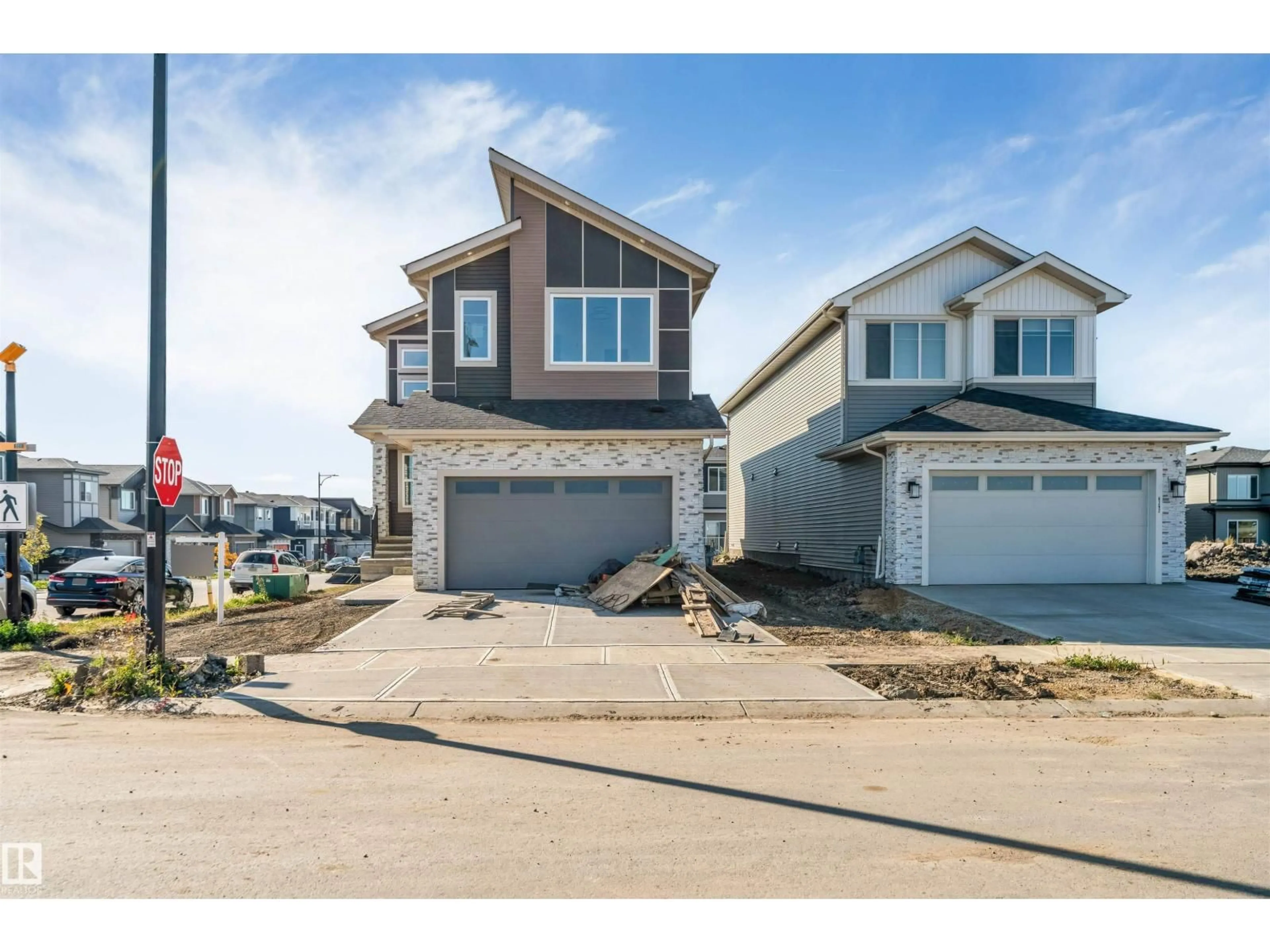 Home with vinyl exterior material, street for NE - 6298 19 ST, Rural Leduc County Alberta T4X3C9