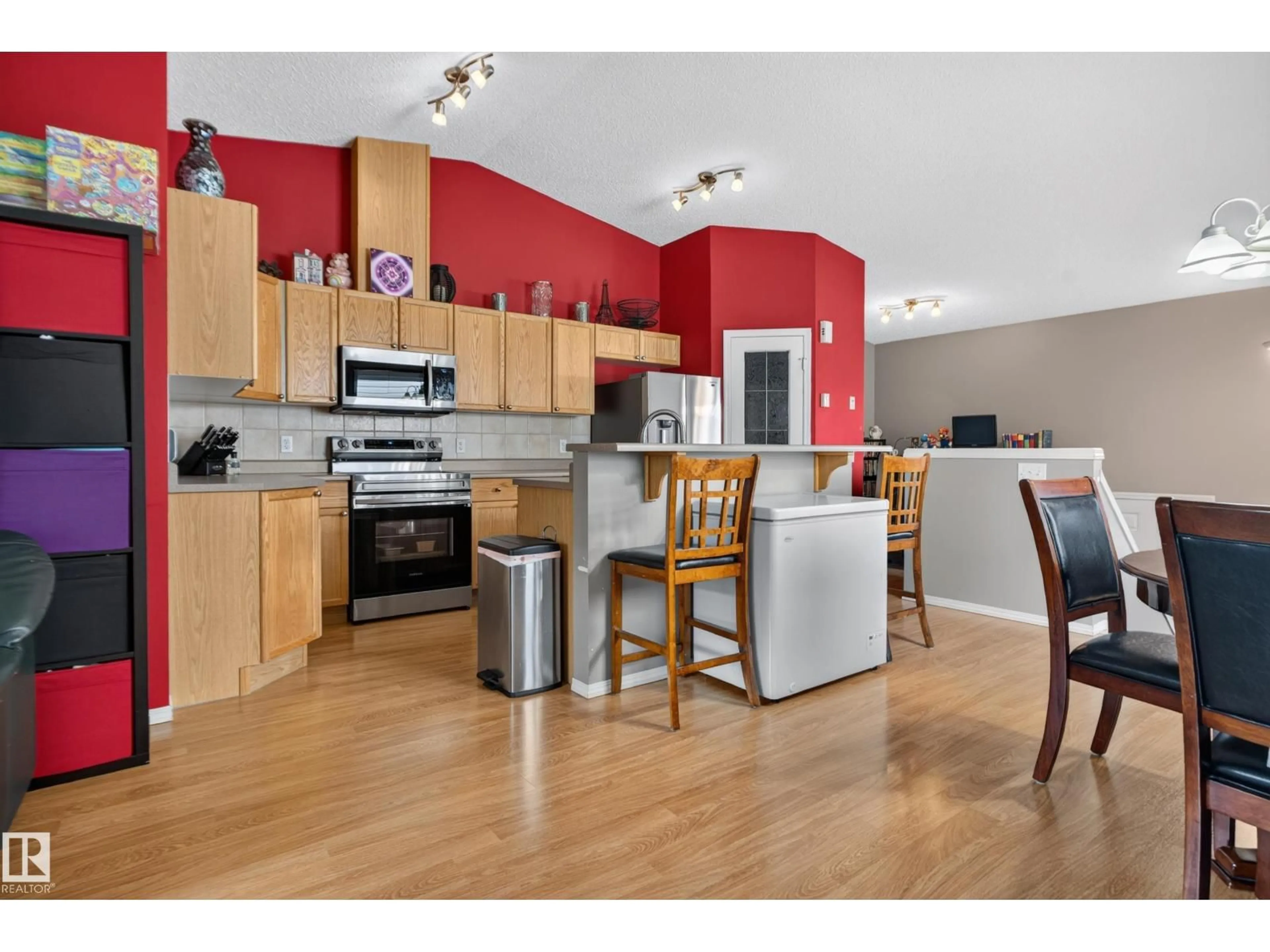 Open concept kitchen, wood/laminate floor for NW - 13915 137 ST, Edmonton Alberta T6V1X3
