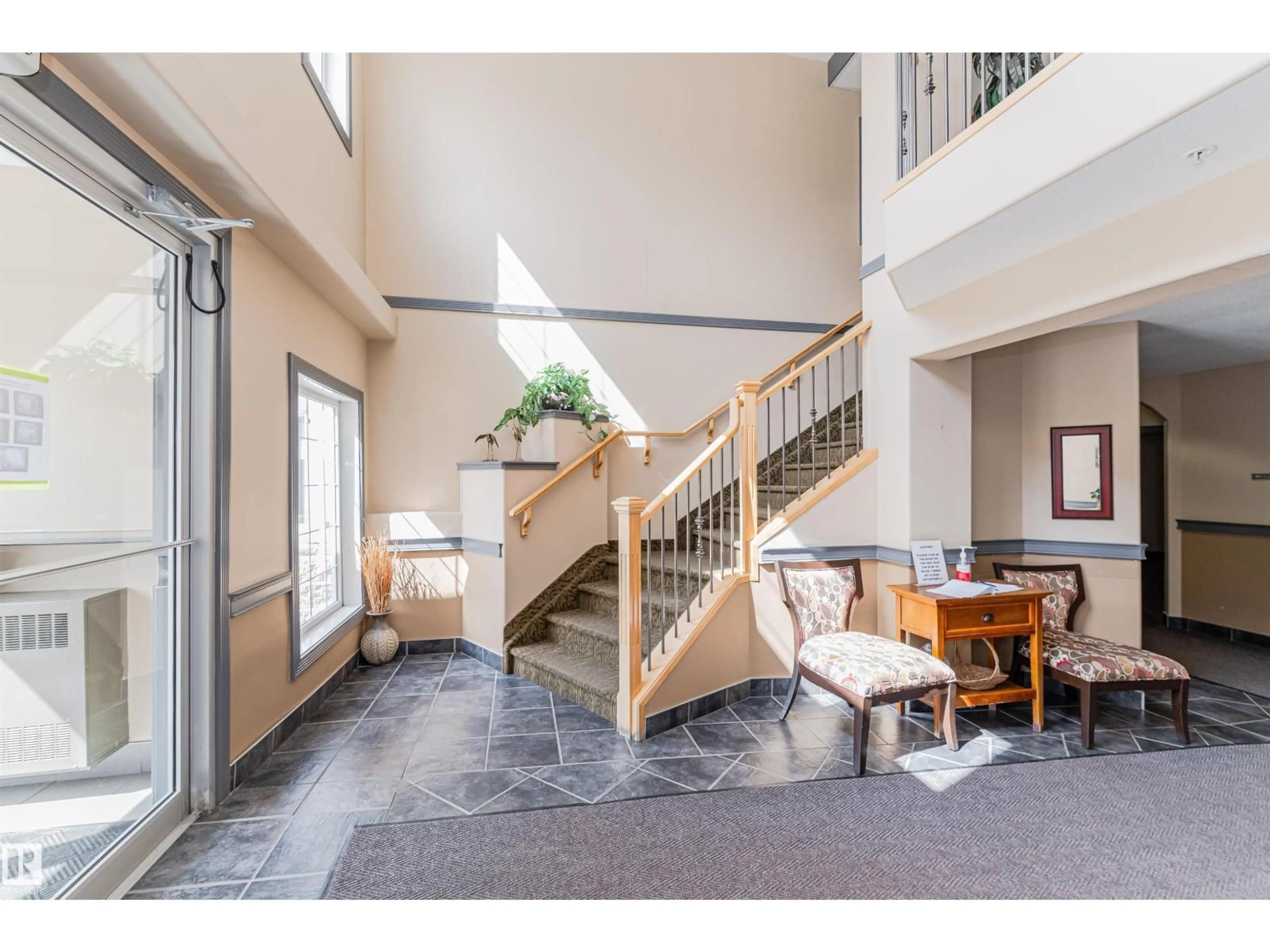 Indoor foyer for #218 - 218 YOUVILLE DR, Edmonton Alberta T6L7H3