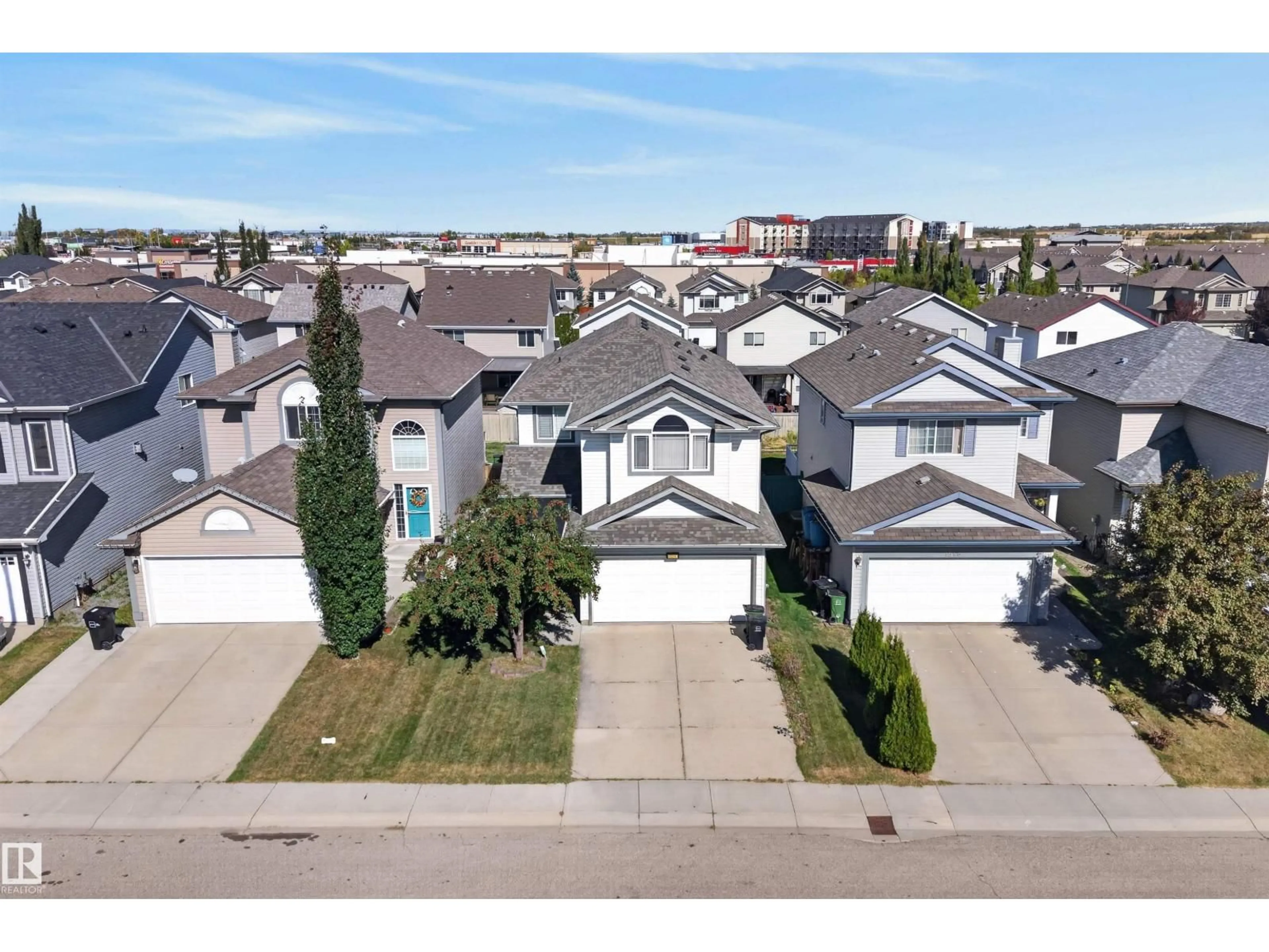A pic from outside/outdoor area/front of a property/back of a property/a pic from drone, street for 1524 37B AV, Edmonton Alberta T6T0E3