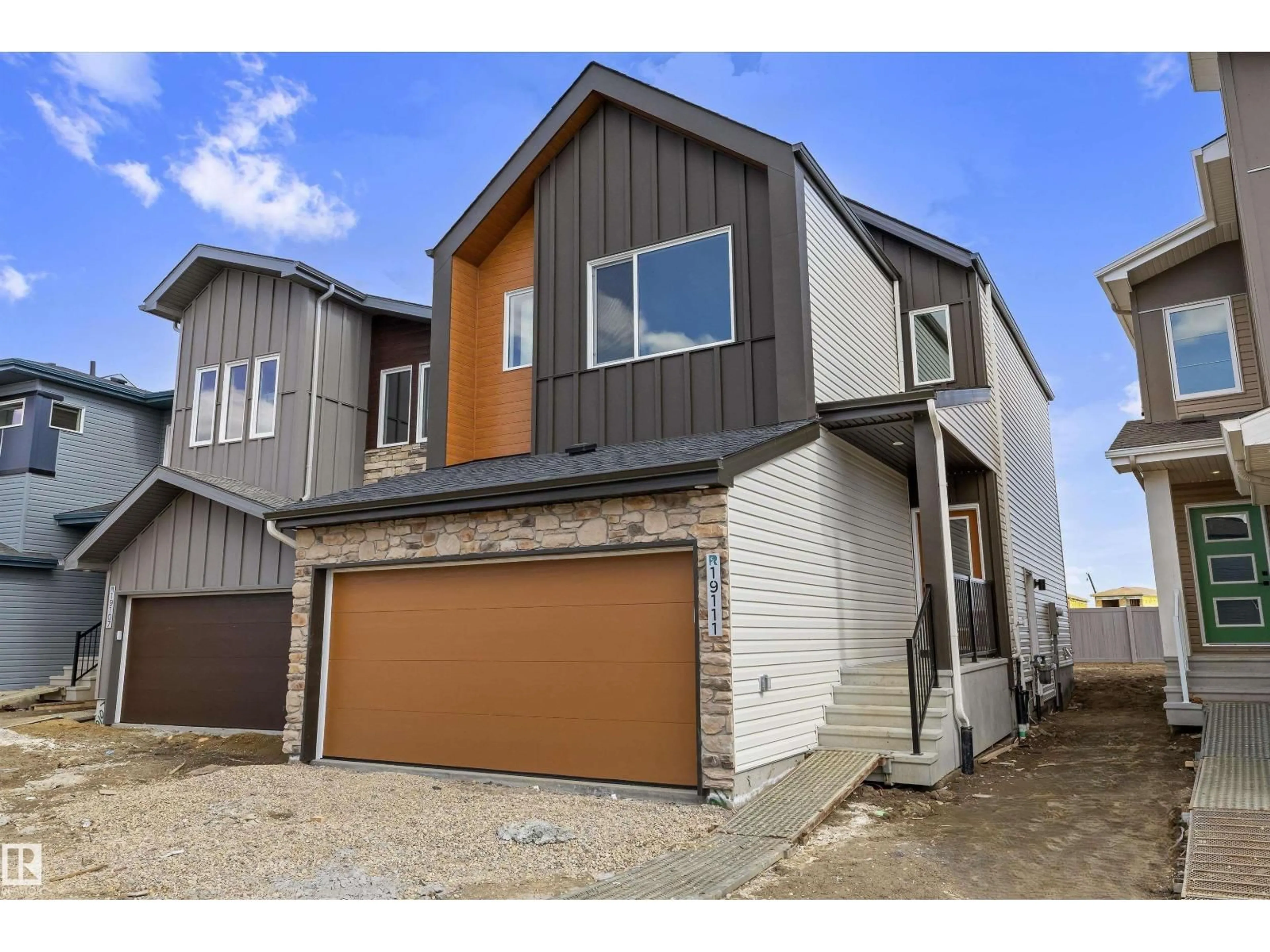 Home with vinyl exterior material, street for 19111 20 AV, Edmonton Alberta T6M3E8