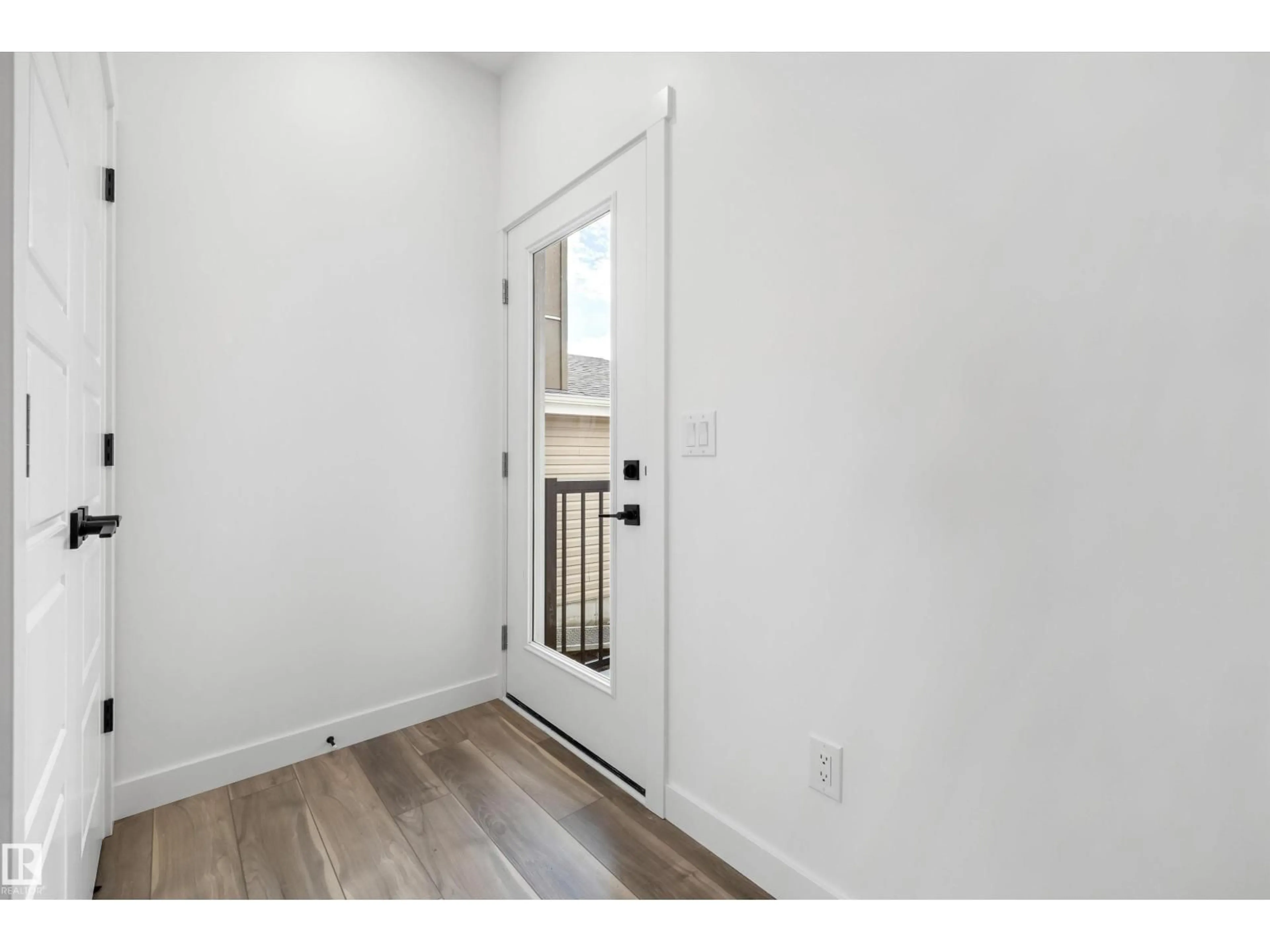 Indoor entryway for 19111 20 AV, Edmonton Alberta T6M3E8
