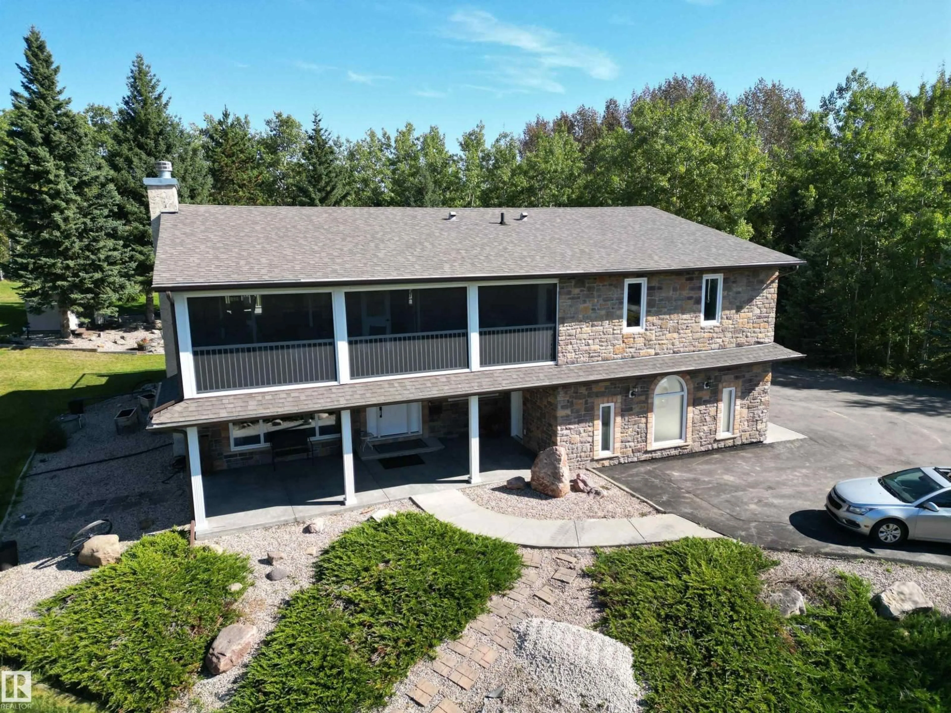 A pic from outside/outdoor area/front of a property/back of a property/a pic from drone, building for 52311 - 145 RGE ROAD 223, Rural Strathcona County Alberta T8C1A9