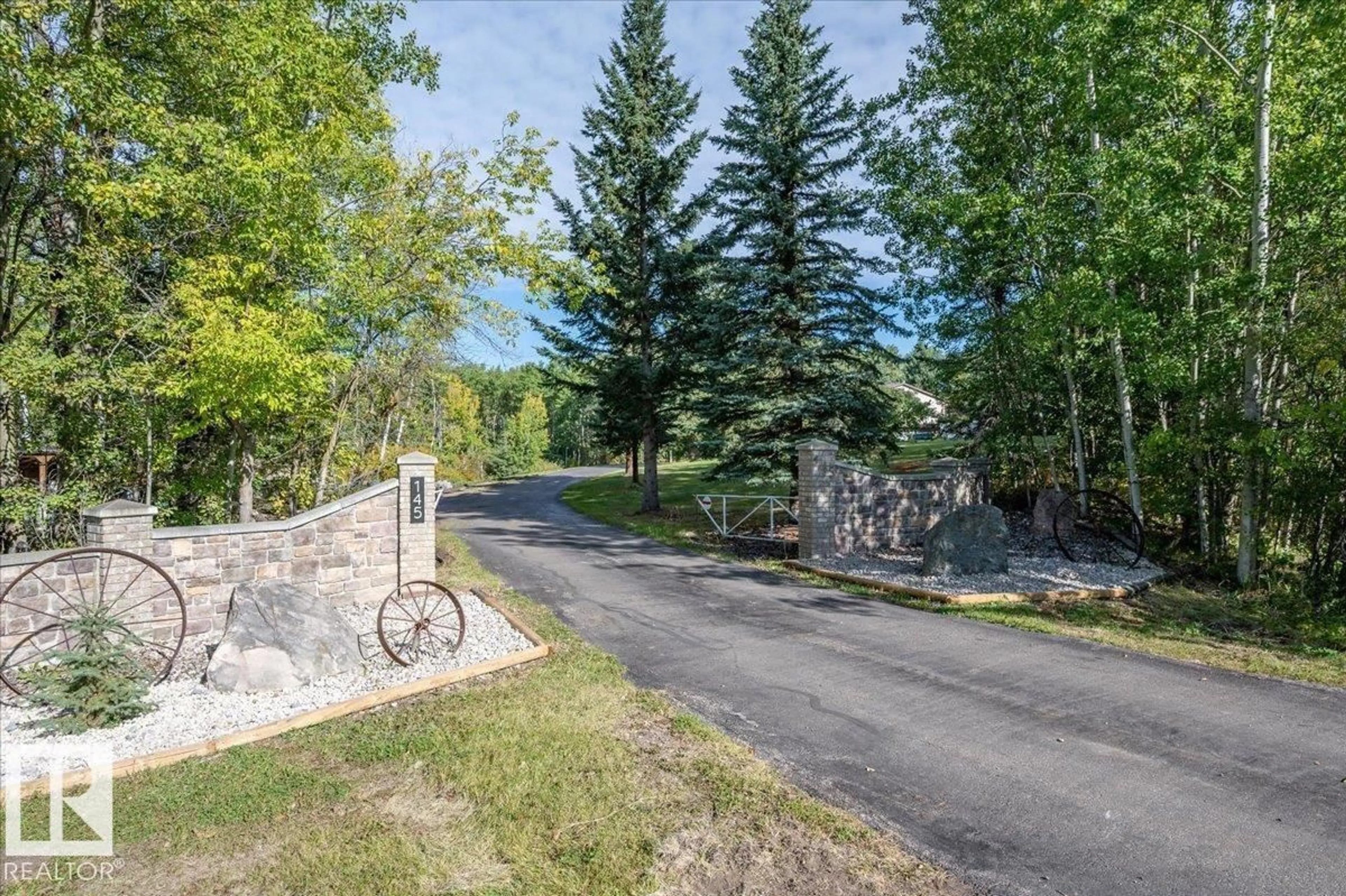A pic from outside/outdoor area/front of a property/back of a property/a pic from drone, mountain view for 52311 - 145 RGE ROAD 223, Rural Strathcona County Alberta T8C1A9