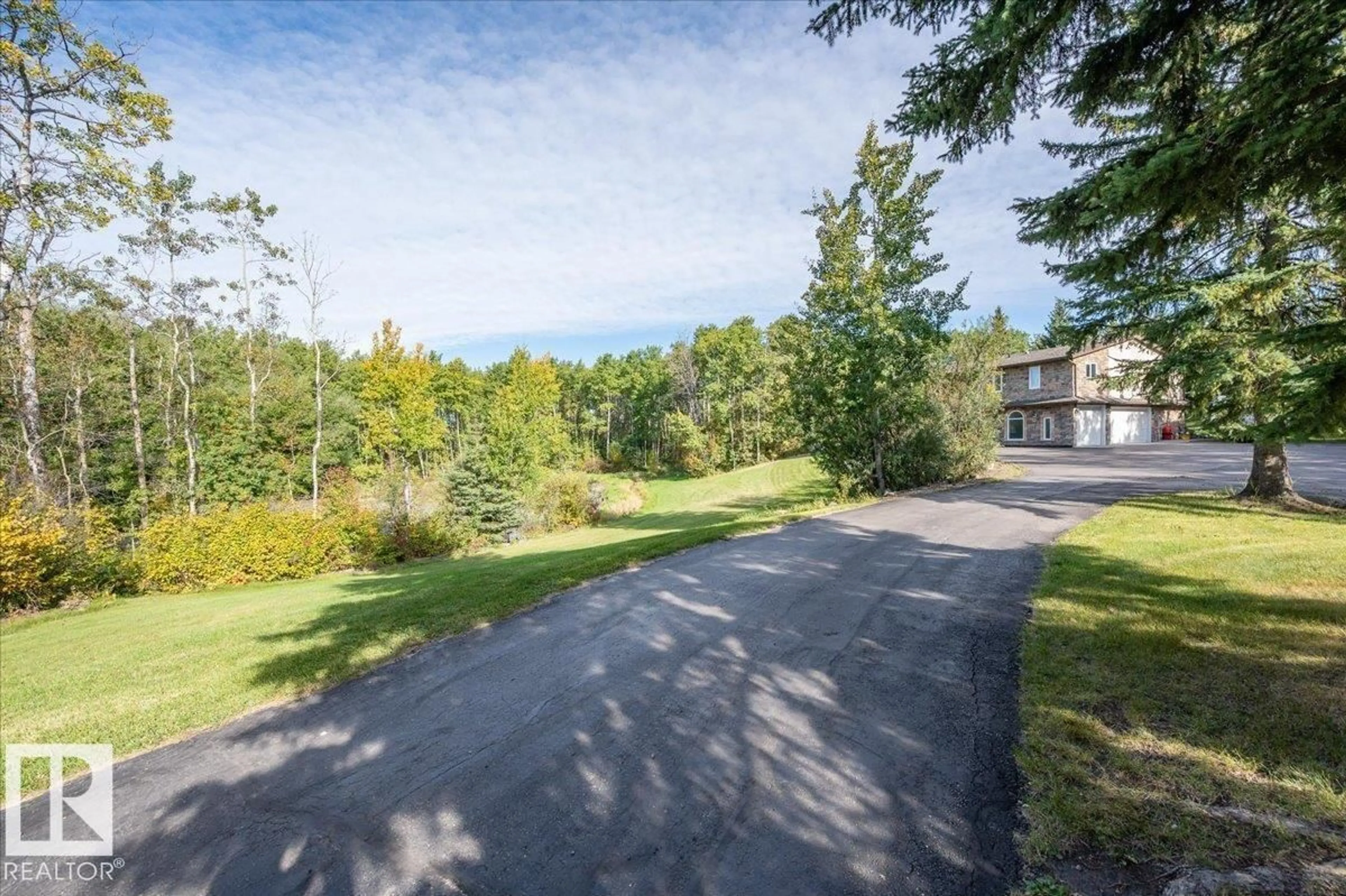 A pic from outside/outdoor area/front of a property/back of a property/a pic from drone, unknown for 52311 - 145 RGE ROAD 223, Rural Strathcona County Alberta T8C1A9