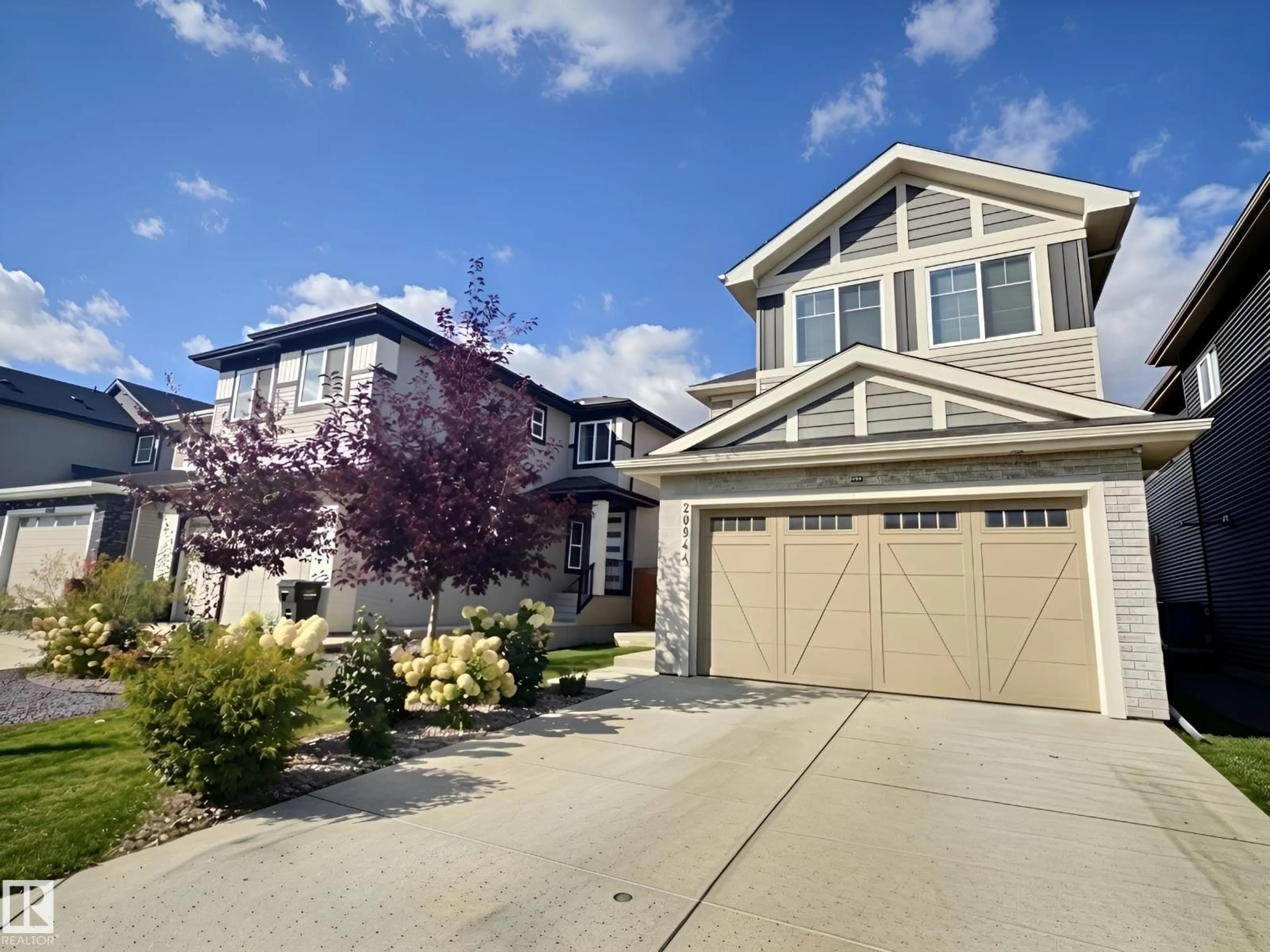 Home with vinyl exterior material, street for 20944 128 AV, Edmonton Alberta T5S0R6