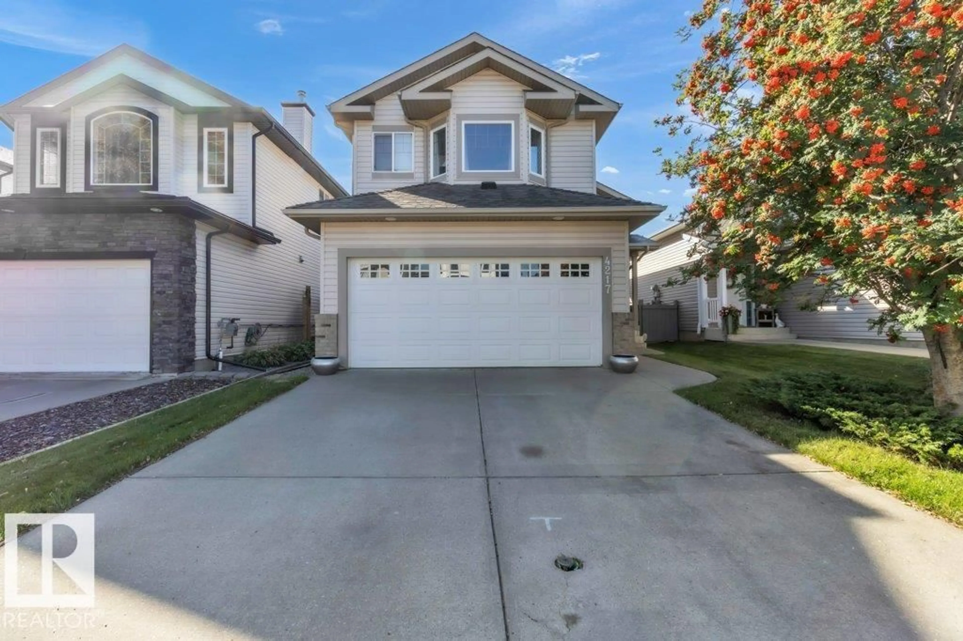 Home with vinyl exterior material, street for 4217 MCMULLEN PL, Edmonton Alberta T6W1S6
