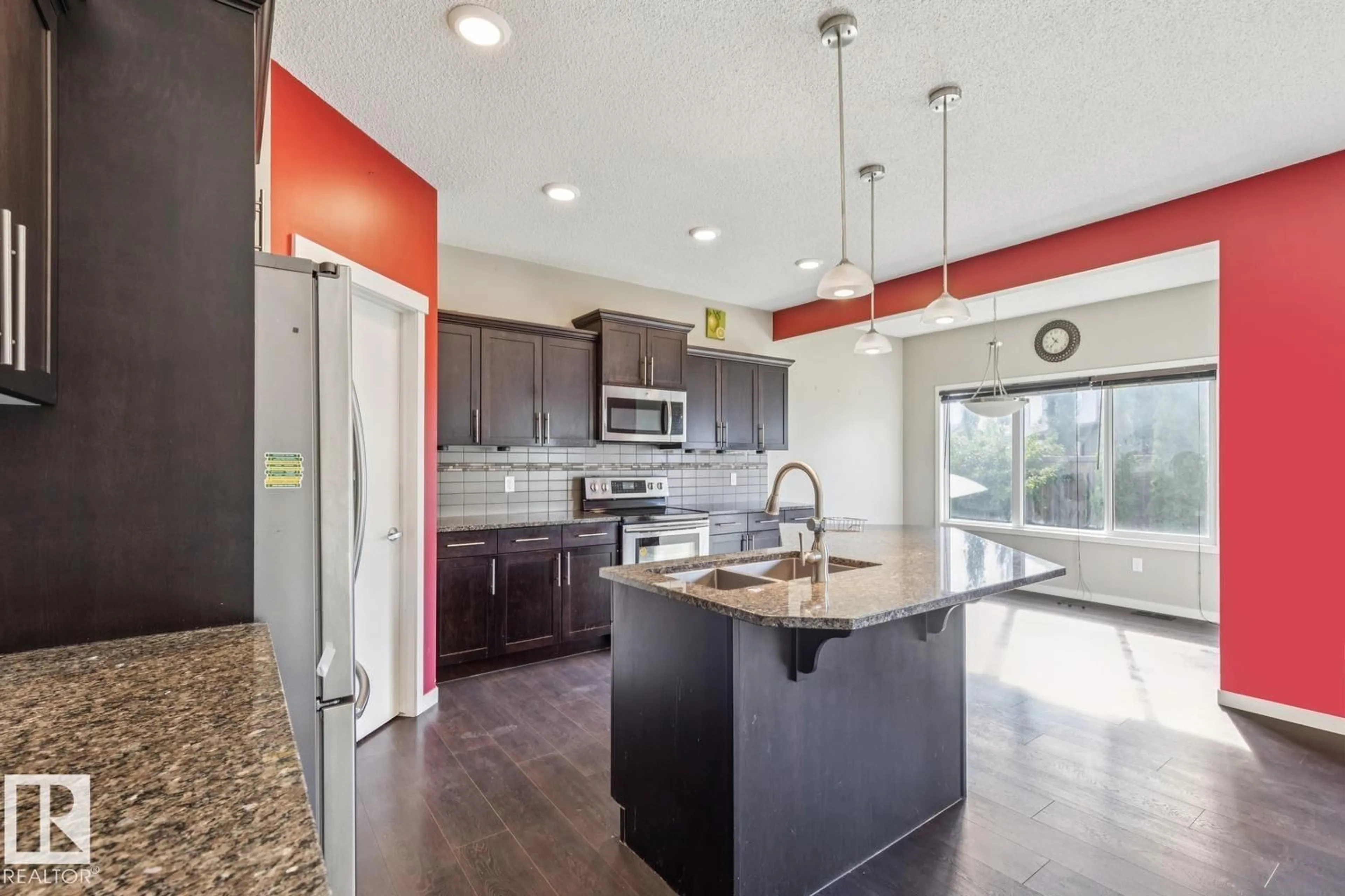 Open concept kitchen, ceramic/tile floor for NW - 12007 173 AV, Edmonton Alberta T5X0J6