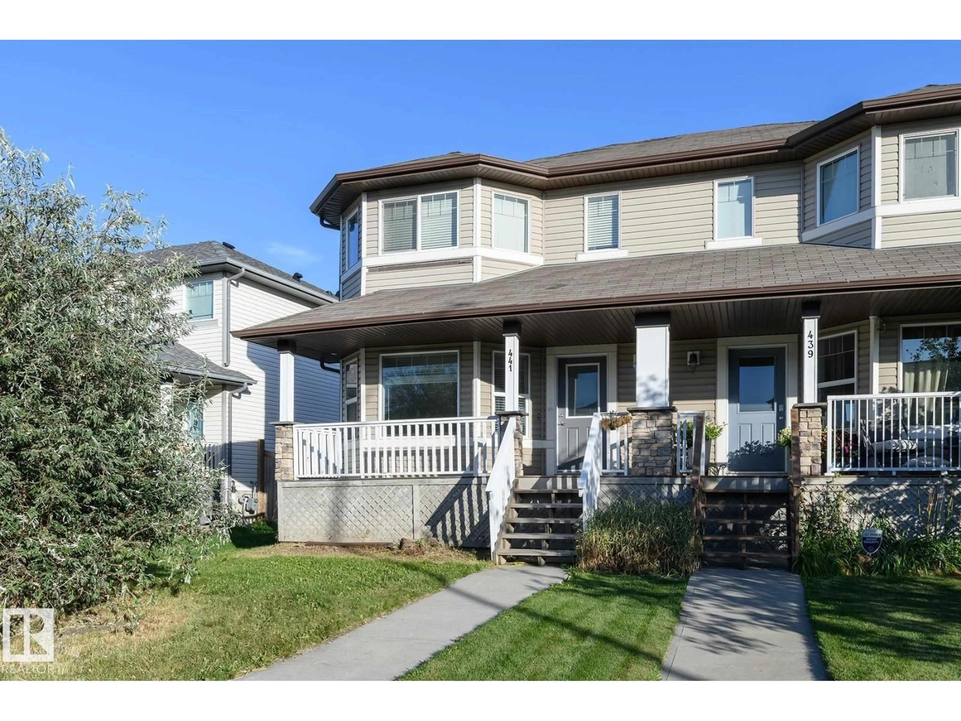 Home with vinyl exterior material, street for 441 SONGHURST PL, Leduc Alberta T9E0P9