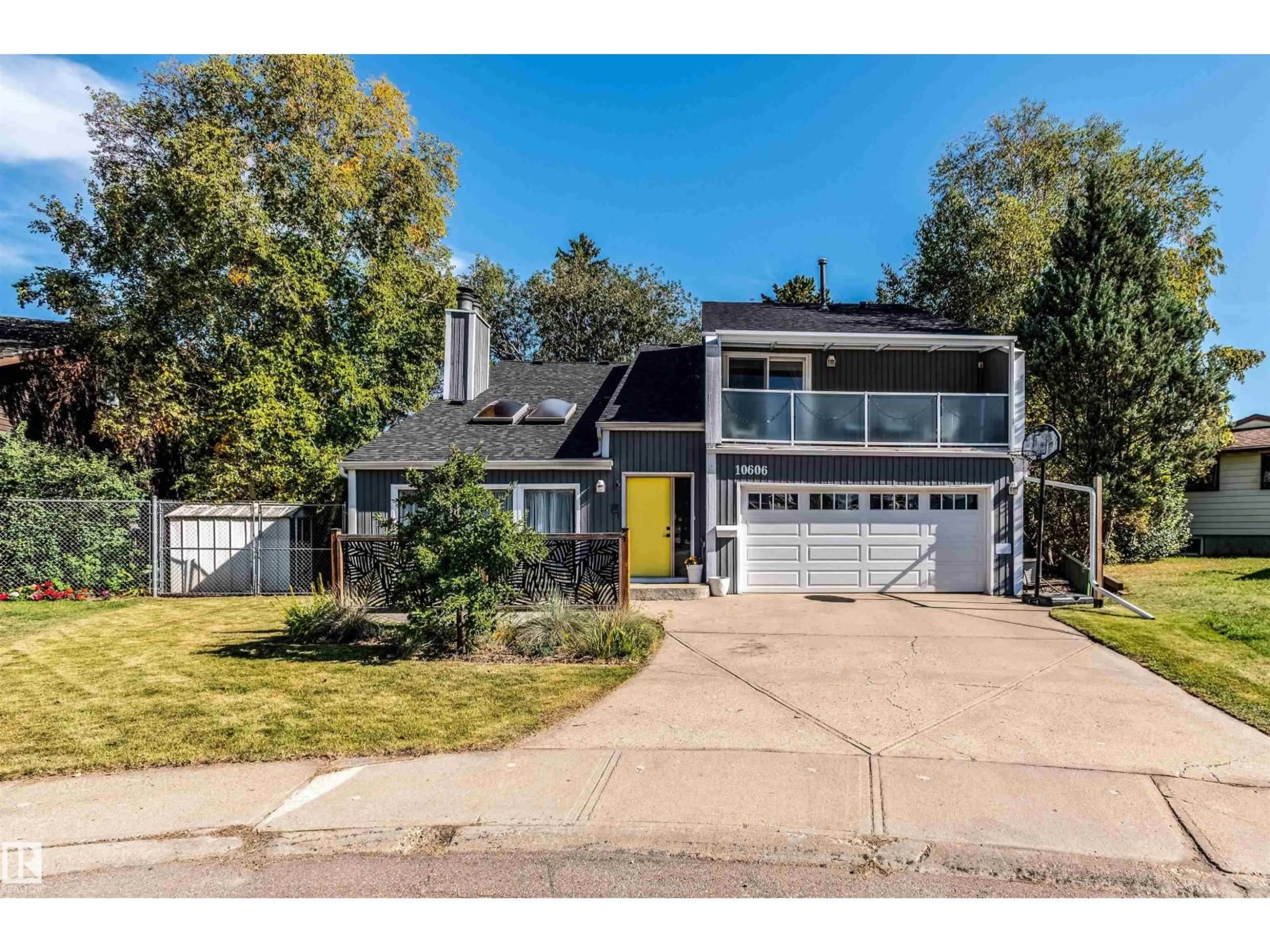 Home with vinyl exterior material, street for 10606 25A AV, Edmonton Alberta T6J4K3