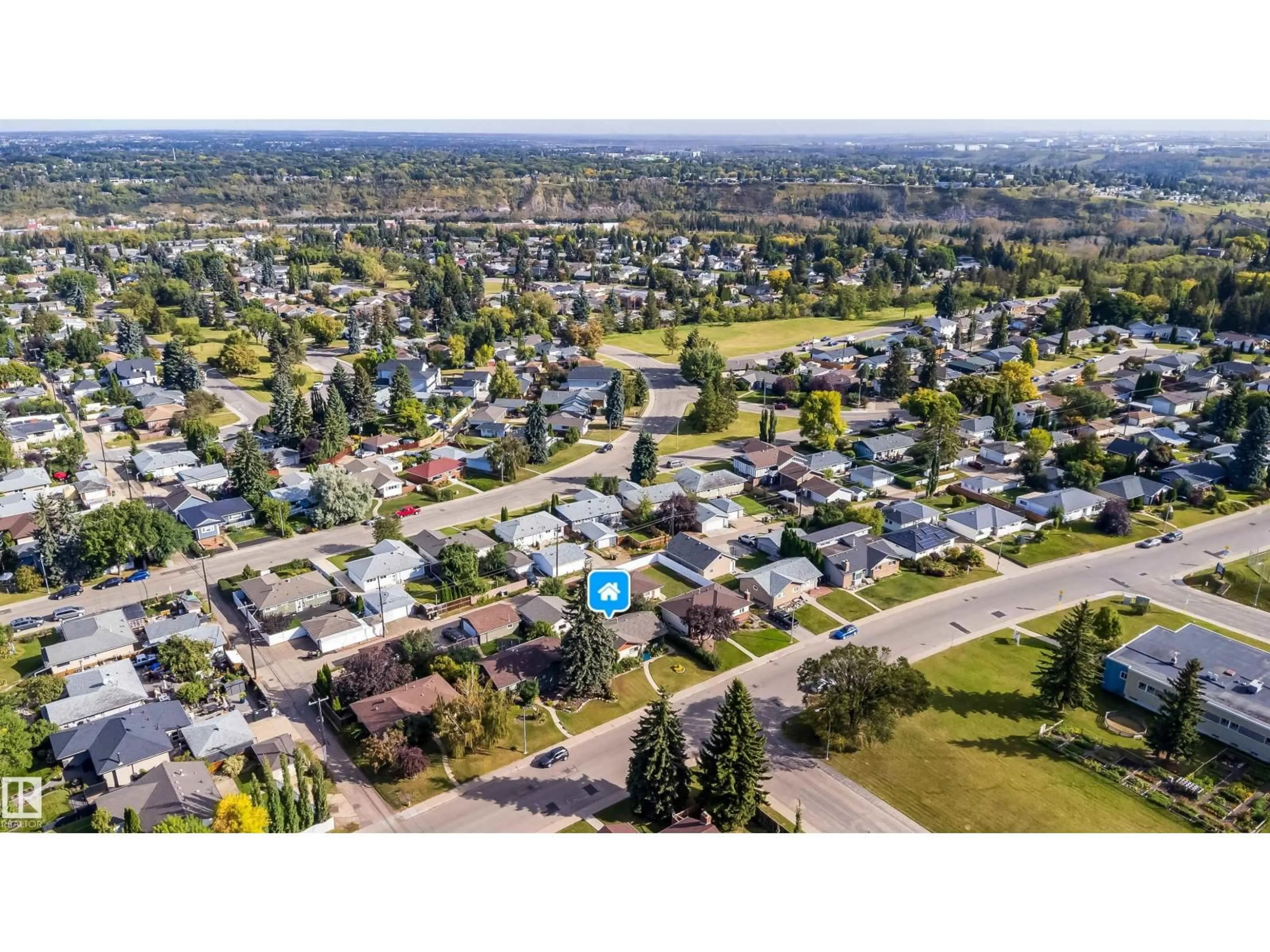 A pic from outside/outdoor area/front of a property/back of a property/a pic from drone, street for 4808 106 AV, Edmonton Alberta T6A1E6