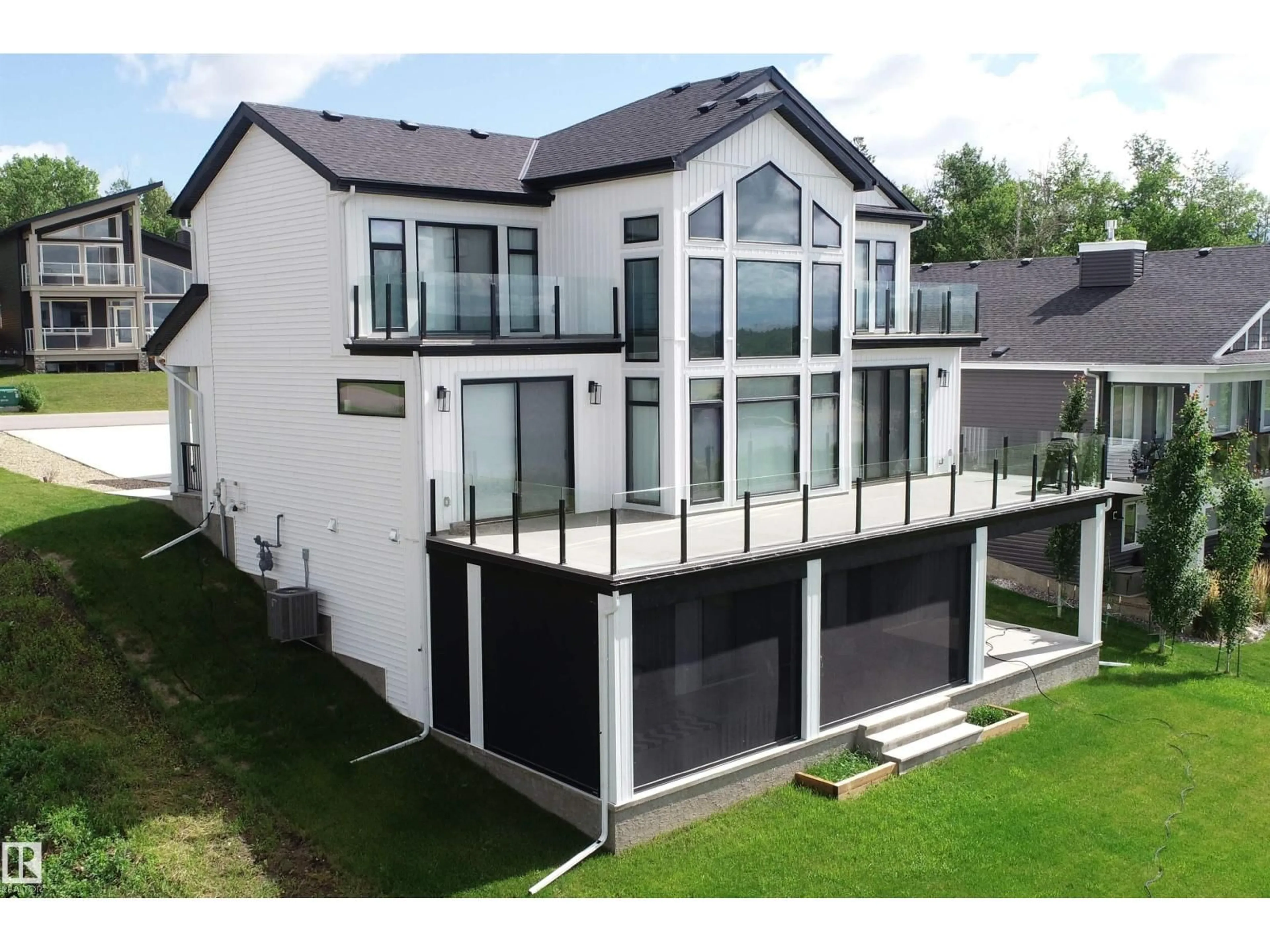 A pic from outside/outdoor area/front of a property/back of a property/a pic from drone, building for STE. - 7 ANNE TR, Rural Lac Ste. Anne County Alberta T0E1A1