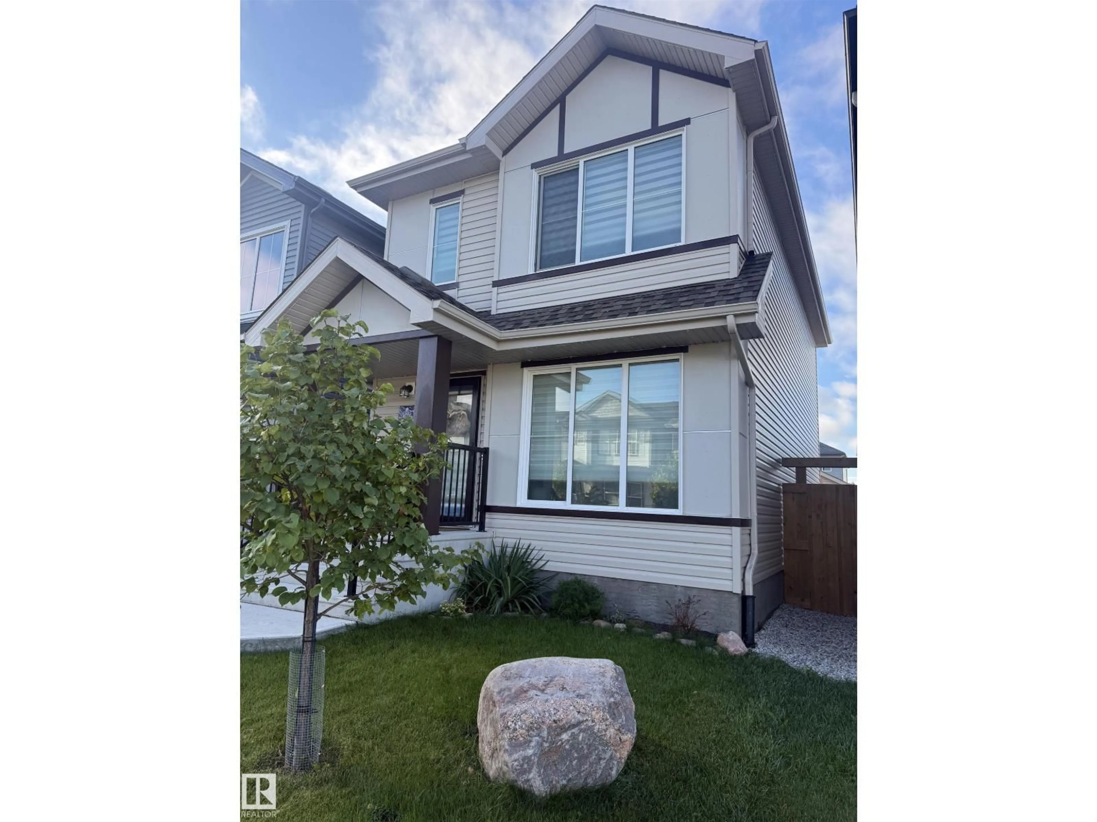 Home with vinyl exterior material, street for 6283 176 AV, Edmonton Alberta T5Y4E5