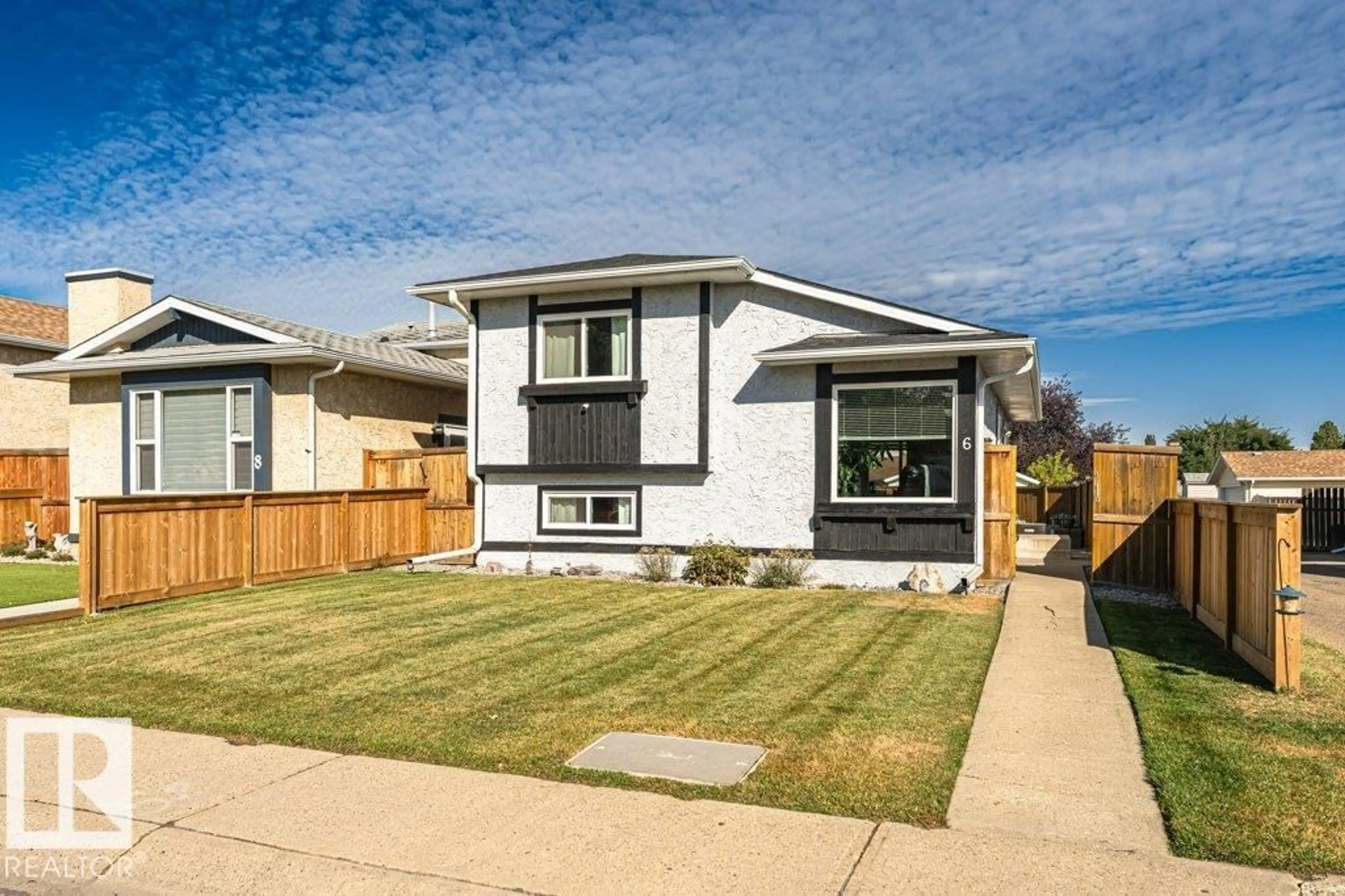 Home with vinyl exterior material, street for 6 KINISKI CR, Edmonton Alberta T6L5A9