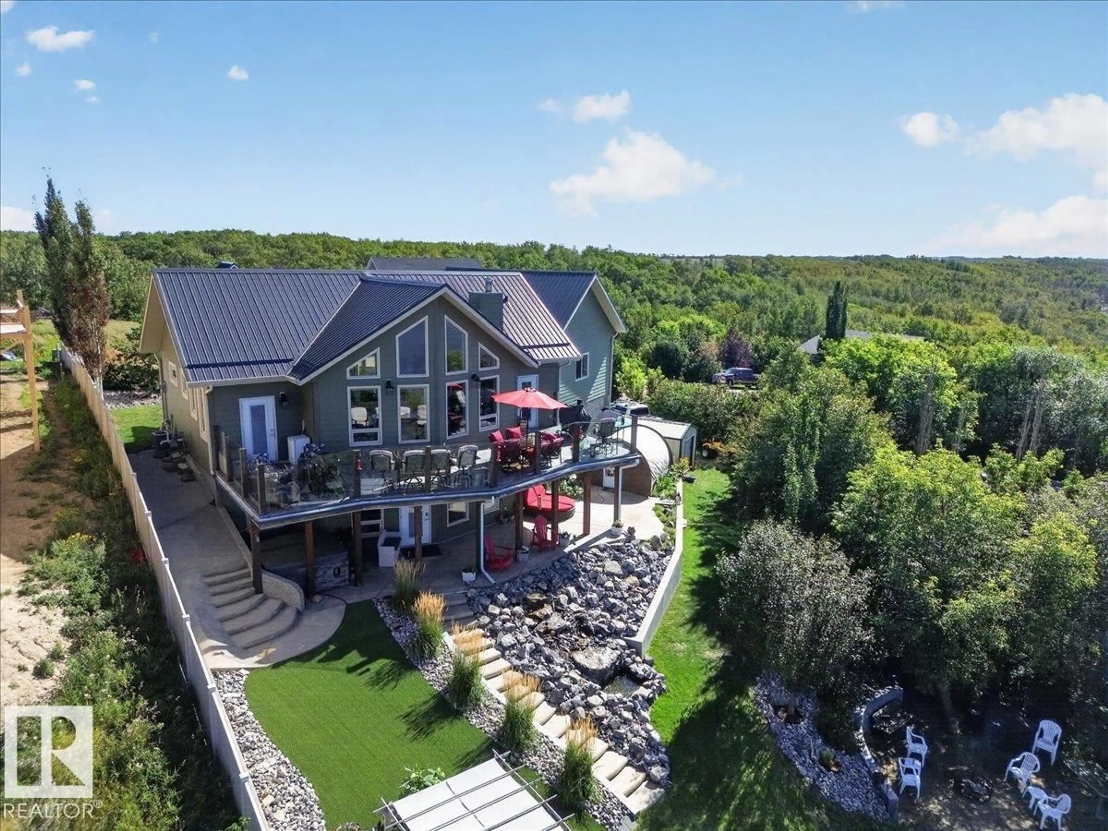 A pic from outside/outdoor area/front of a property/back of a property/a pic from drone, unknown for 19518 - 141 TOWNSHIP ROAD 452, Rural Camrose County Alberta T4V2M9