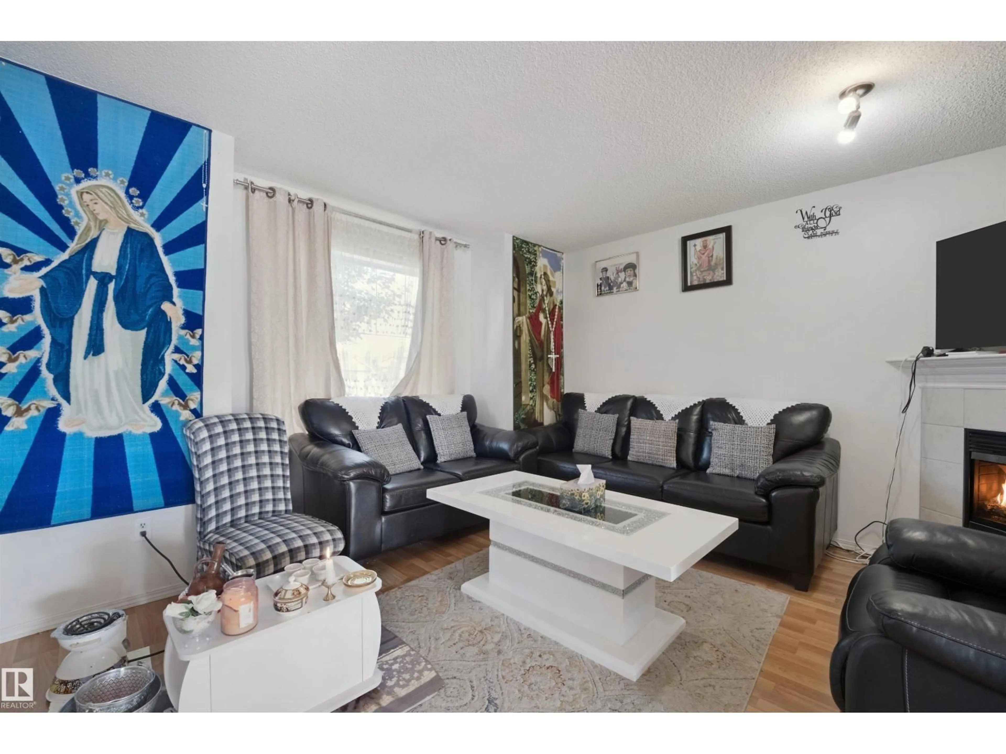 Living room with furniture, unknown for 15911 38 ST, Edmonton Alberta T5Y3E9