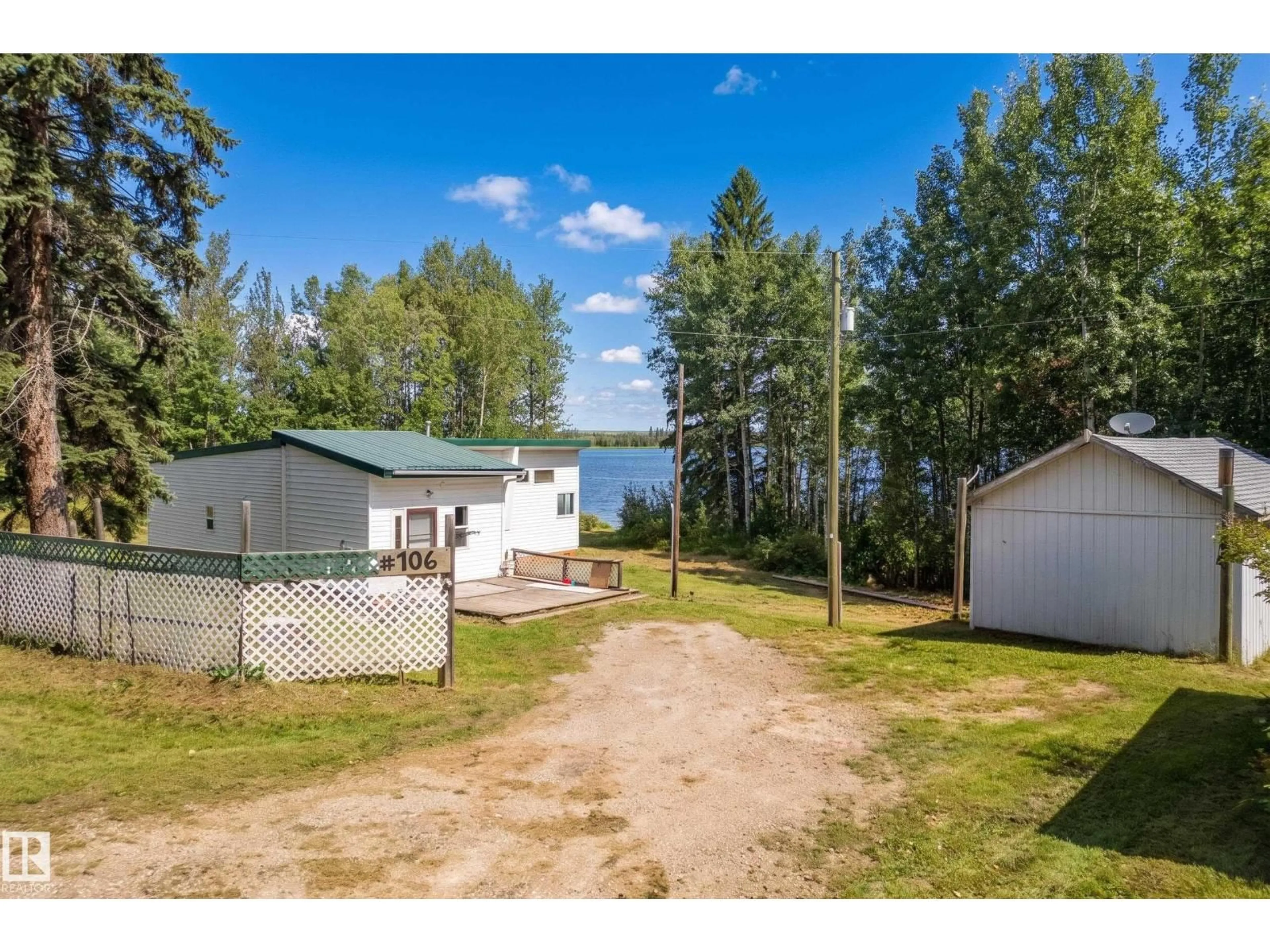 A pic from outside/outdoor area/front of a property/back of a property/a pic from drone, water/lake/river/ocean view for 52502 - 106 RGE ROAD 25, Rural Parkland County Alberta T7Y2M2