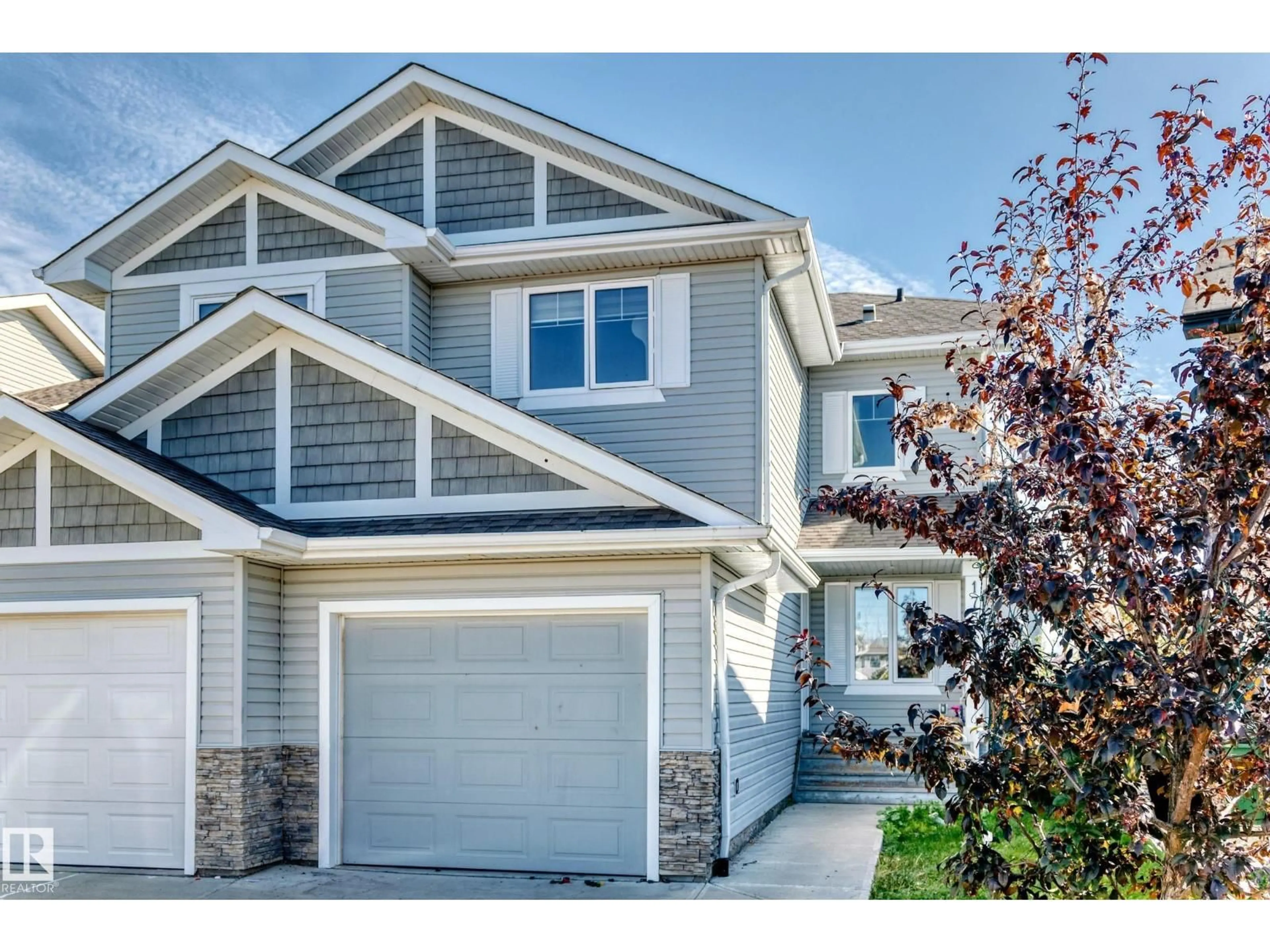 Home with vinyl exterior material, street for 17311 120 ST NW, Edmonton Alberta T5X0J6