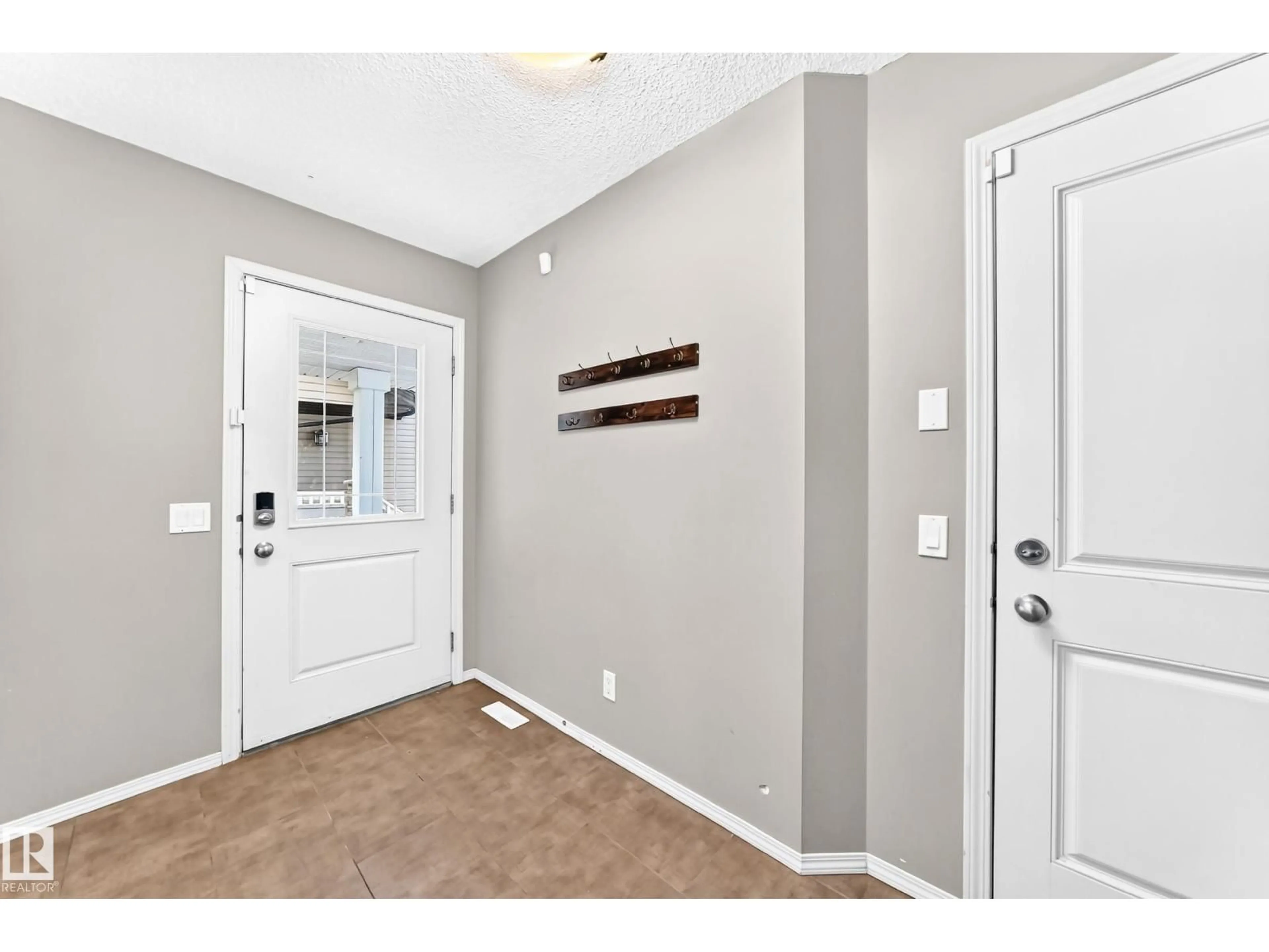 Indoor entryway for 17311 120 ST NW, Edmonton Alberta T5X0J6