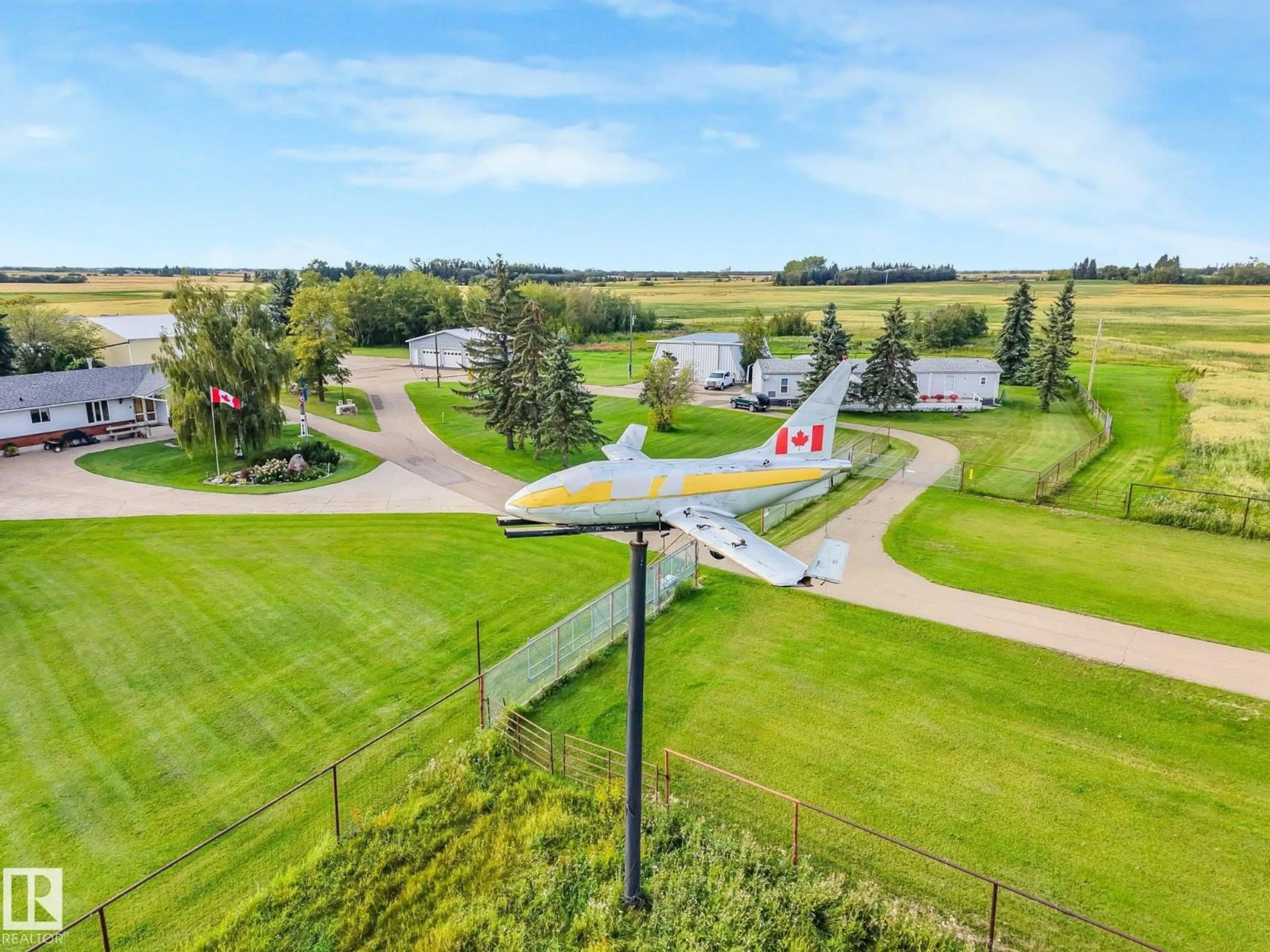 A pic from outside/outdoor area/front of a property/back of a property/a pic from drone, unknown for 55120 HIGHWAY 2 NW, Rural Sturgeon County Alberta T8R1P4