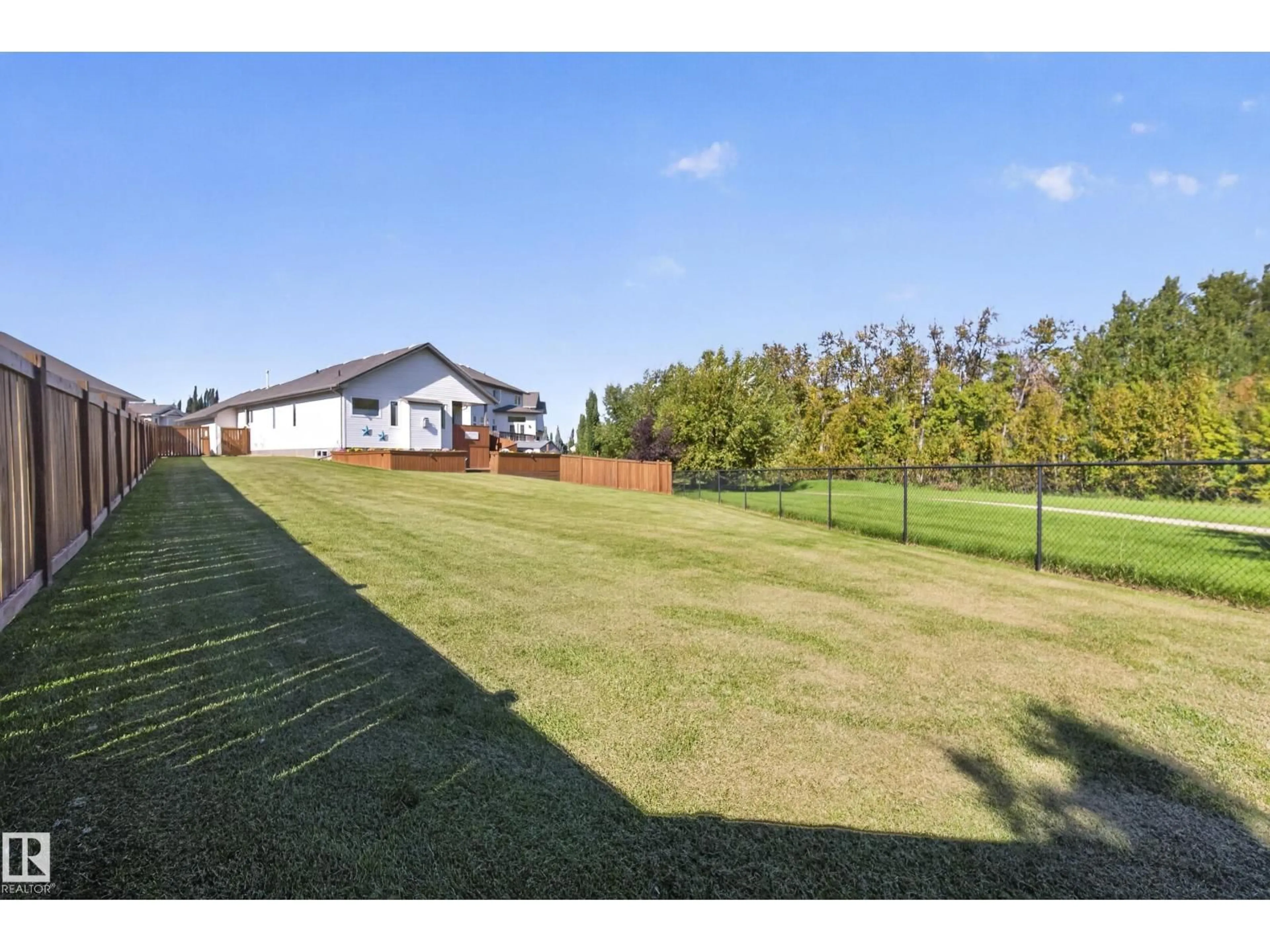 A pic from outside/outdoor area/front of a property/back of a property/a pic from drone, unknown for 27 SILVERSTONE DR, Stony Plain Alberta T7Z0E8