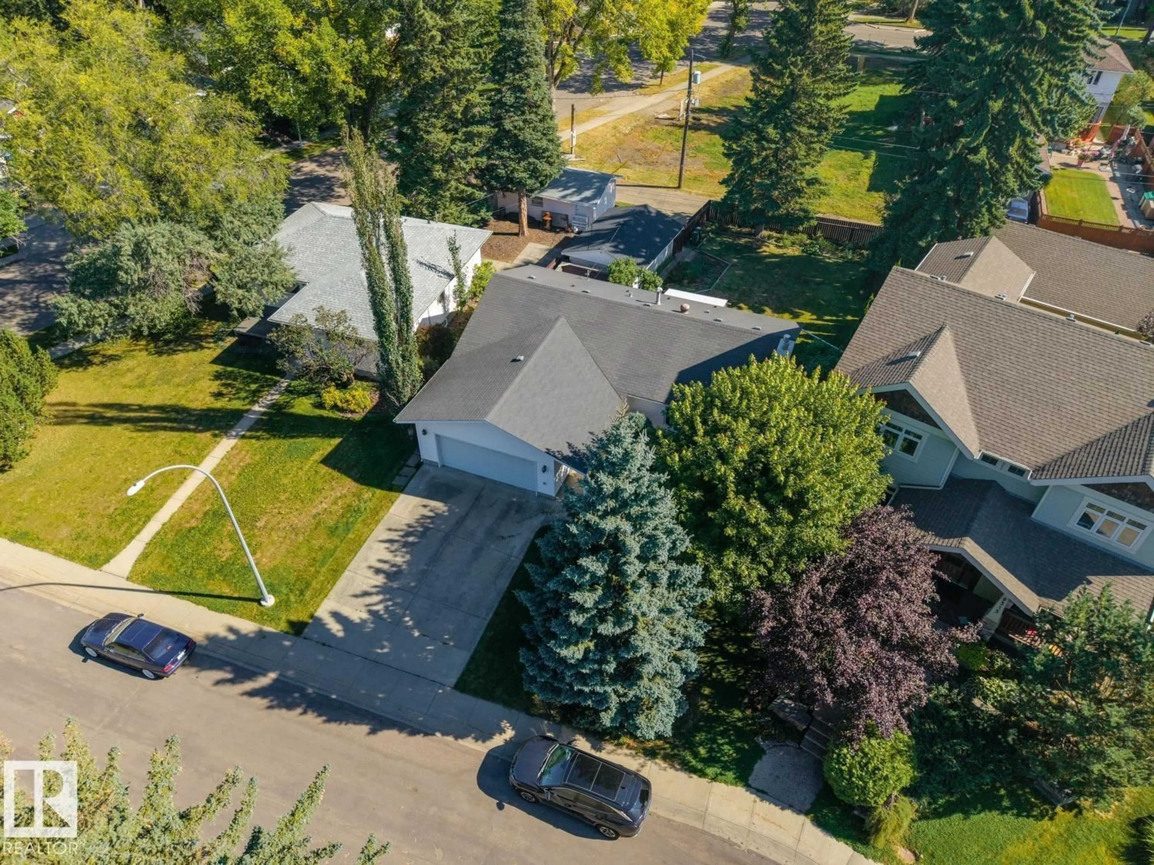 A pic from outside/outdoor area/front of a property/back of a property/a pic from drone, street for NW - 9319 147 ST, Edmonton Alberta T5R0Y8