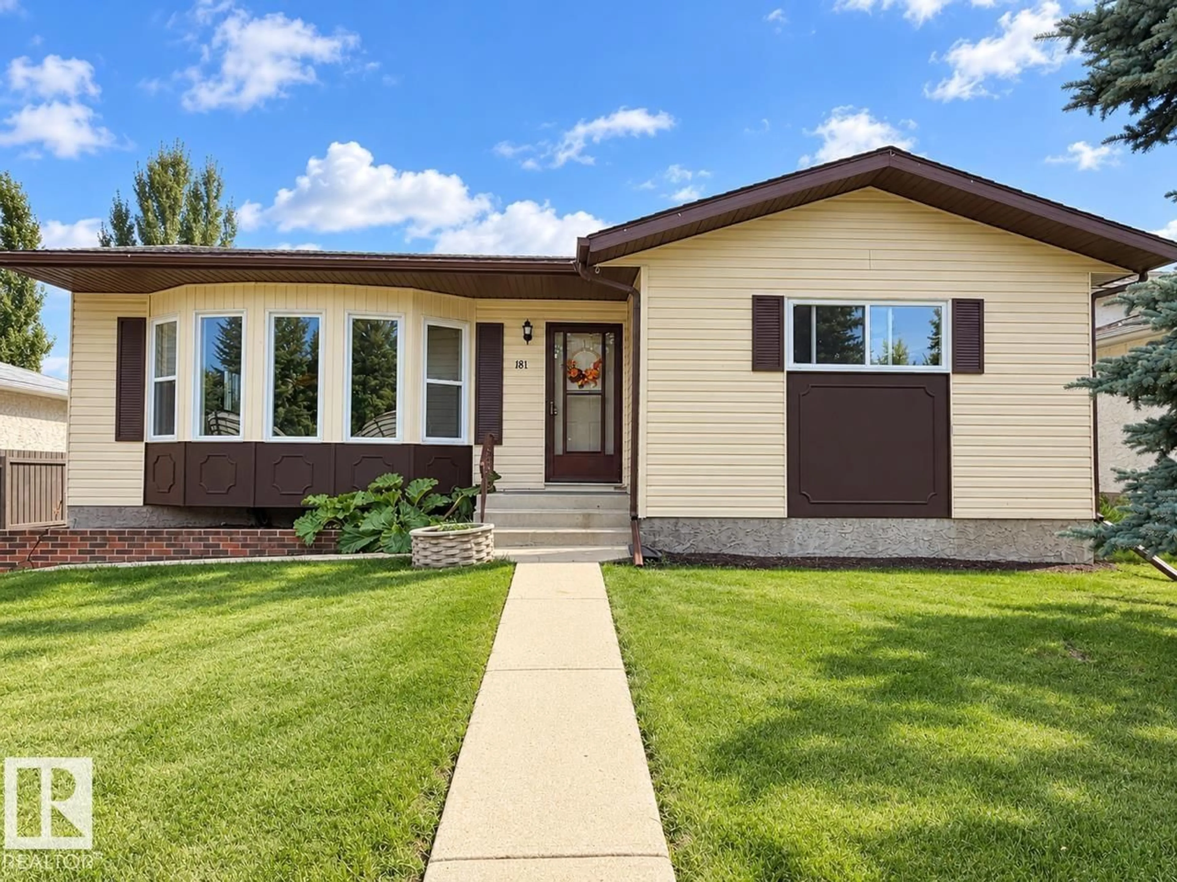 Home with vinyl exterior material, street for 181 PORTER, Millet Alberta T0C1Z0