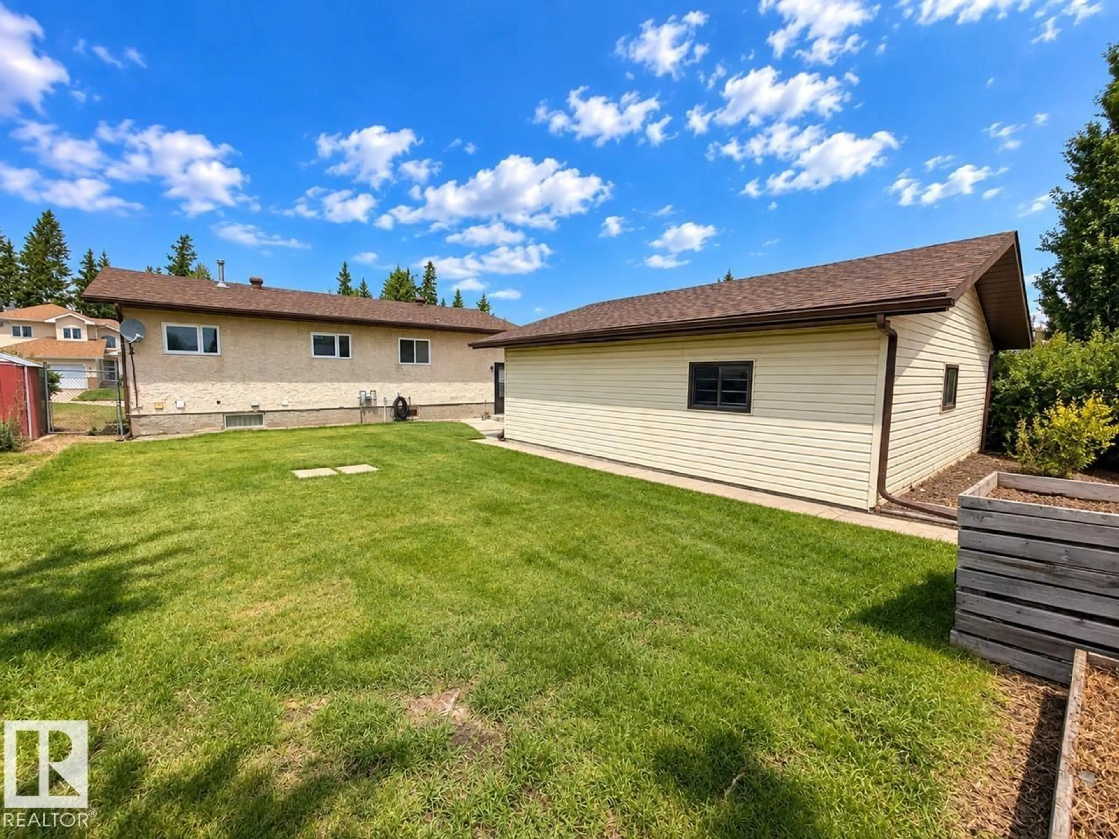 A pic from outside/outdoor area/front of a property/back of a property/a pic from drone, water/lake/river/ocean view for 181 PORTER, Millet Alberta T0C1Z0