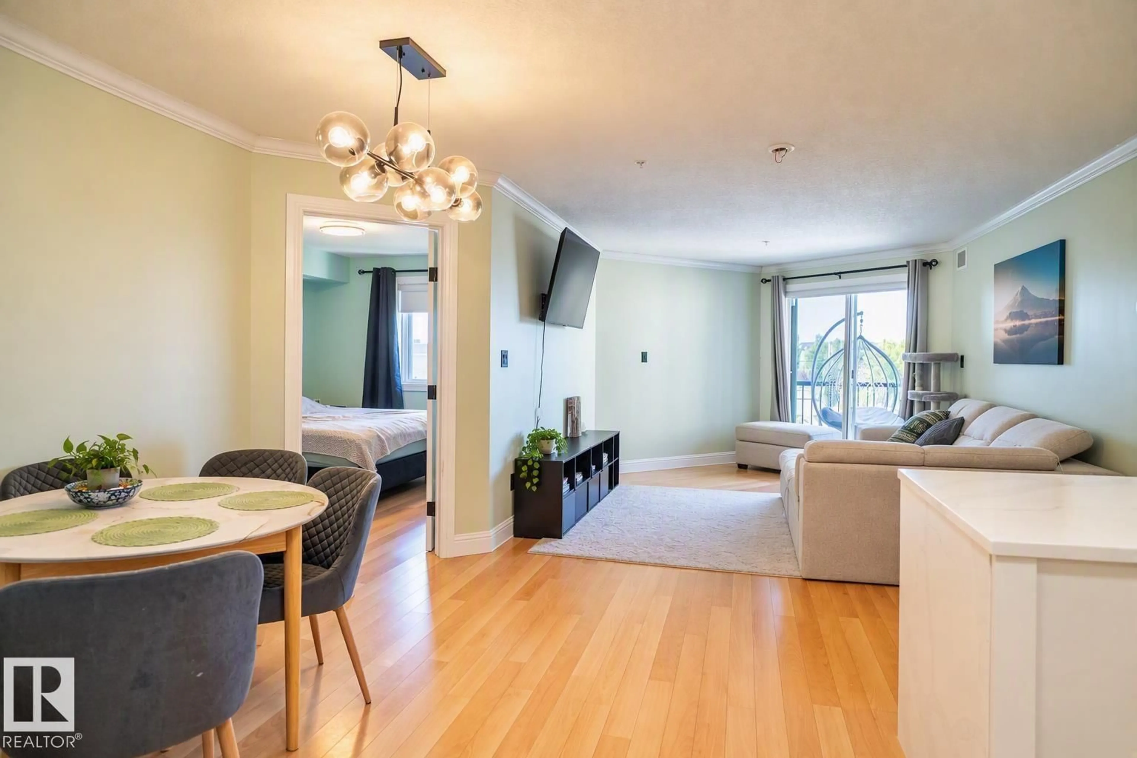 Living room with furniture, wood/laminate floor for #307 - 13111 140 AV, Edmonton Alberta T6V0B1