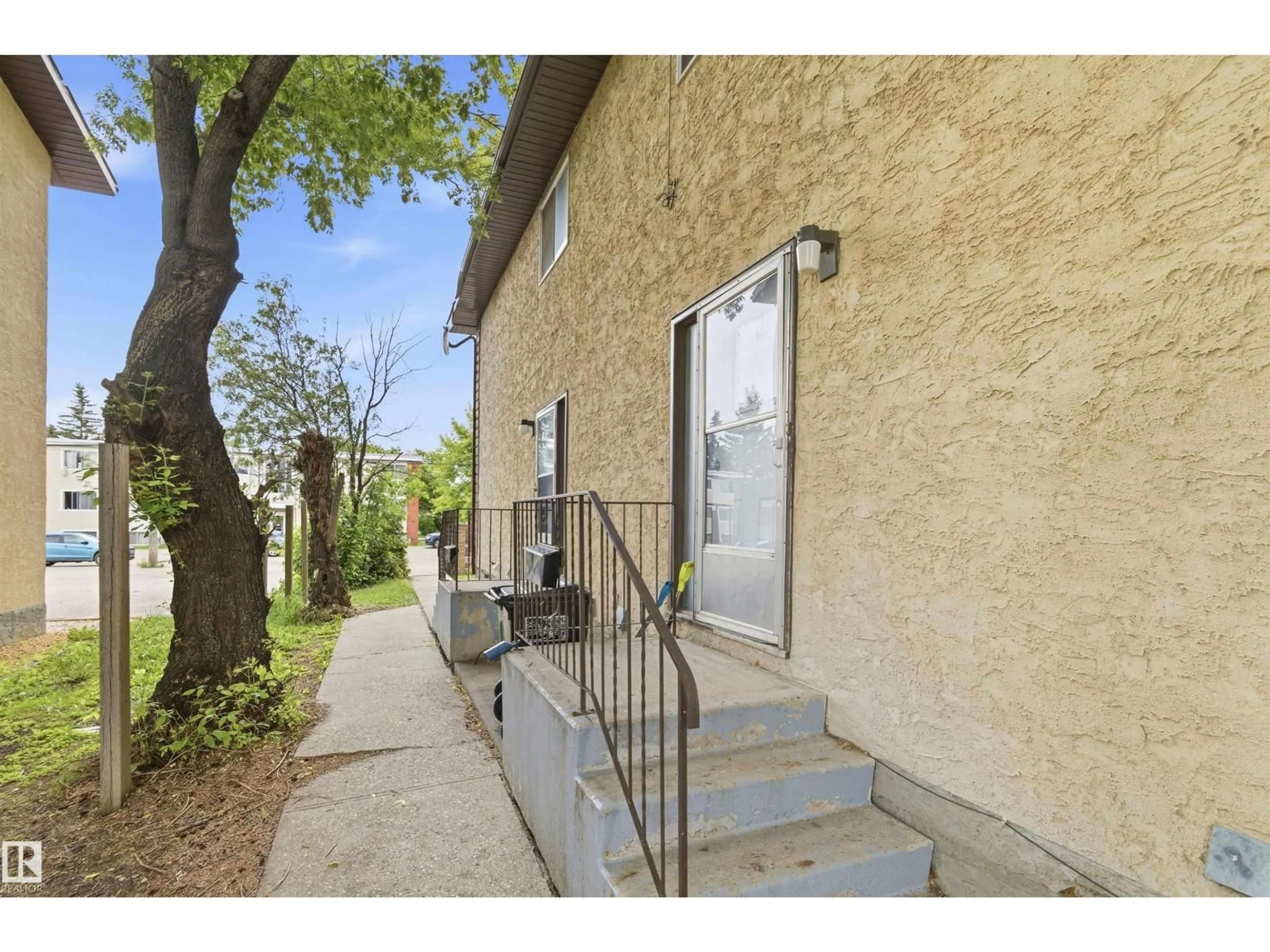 Patio, street for NW - 7115-7121 80 AV, Edmonton Alberta T6B0C7