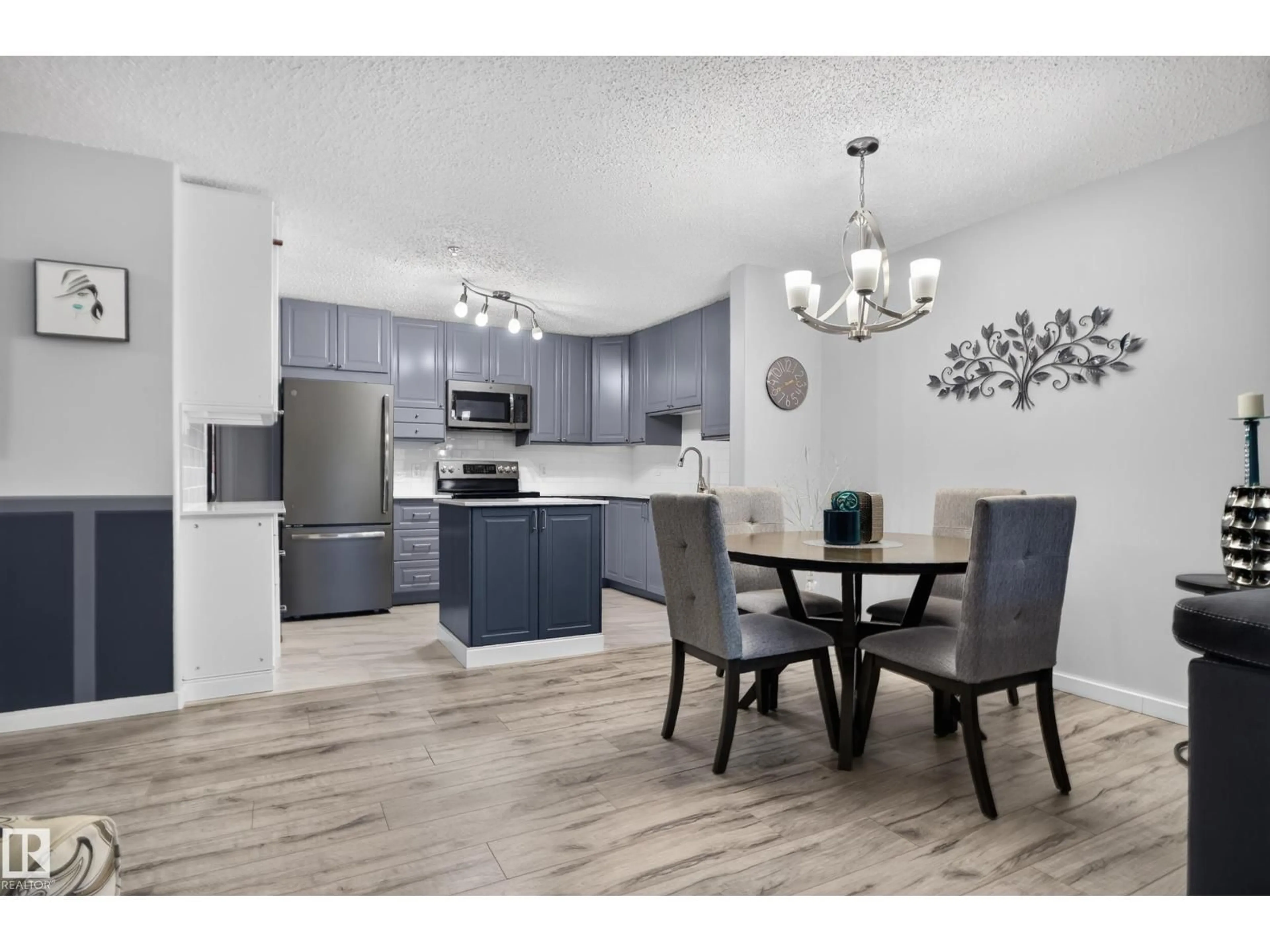 Open concept kitchen, wood/laminate floor for 2098 - 118 BLACKMUD CREEK DR, Edmonton Alberta T6W1T7