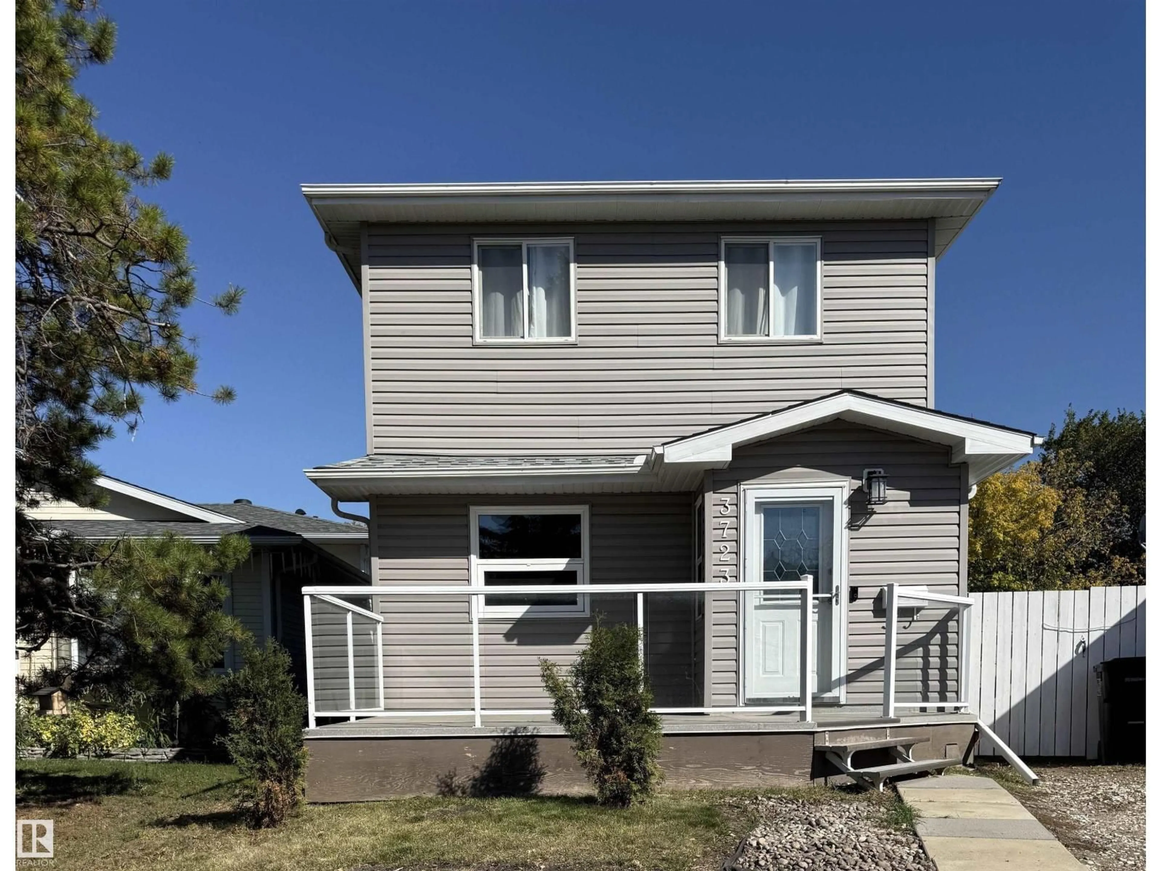 Home with vinyl exterior material, street for 3723 46 ST, Edmonton Alberta T6L3T7