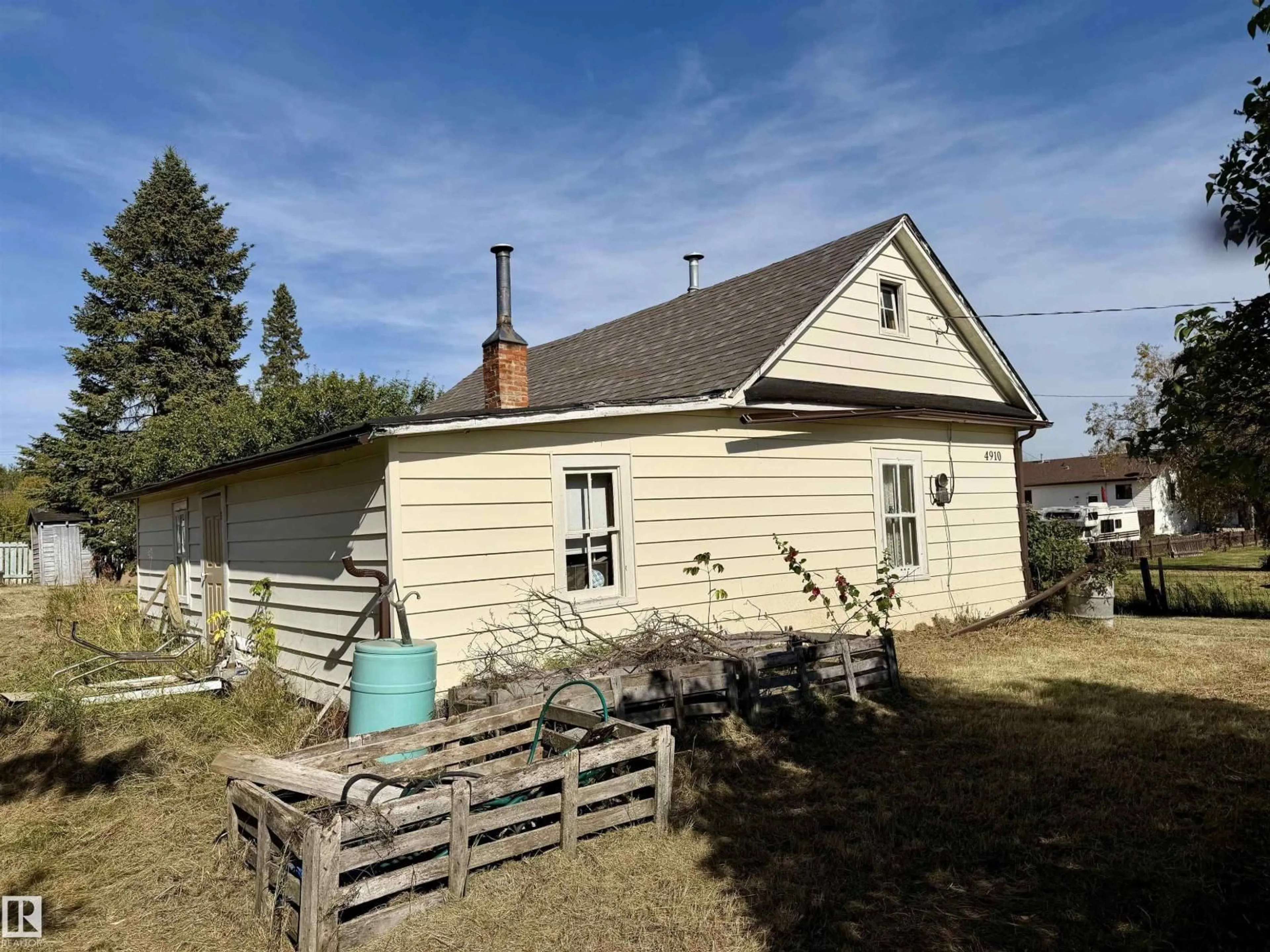 A pic from outside/outdoor area/front of a property/back of a property/a pic from drone, unknown for 4910 50 AVENUE, Spedden Alberta T0A3E0