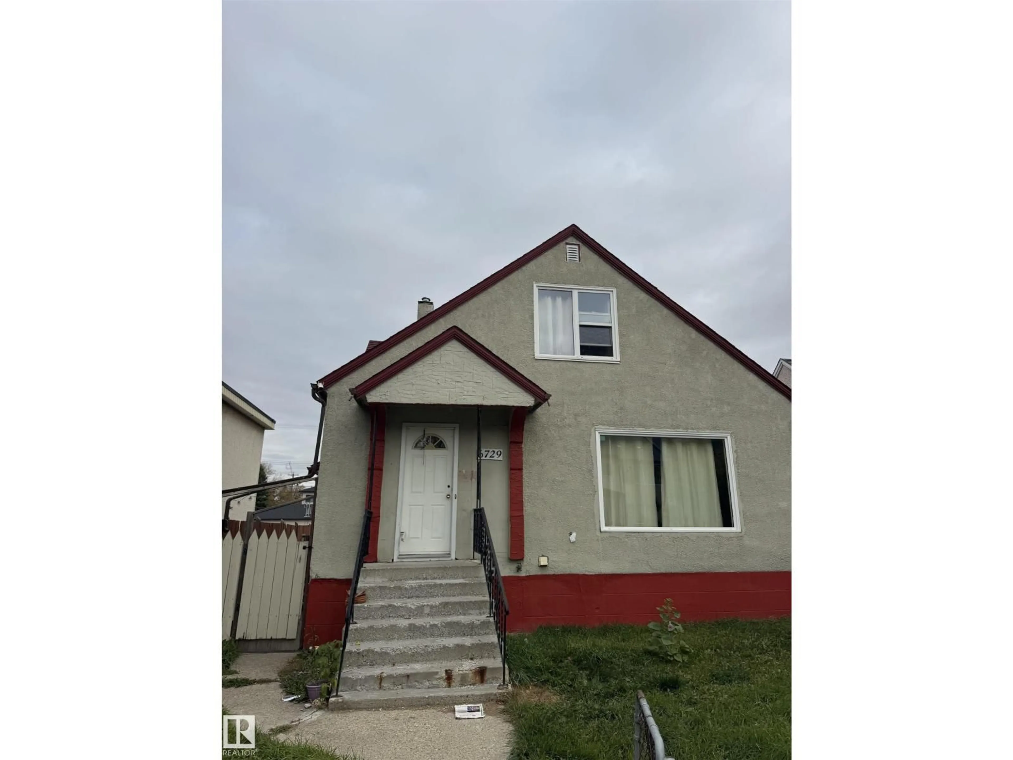 Home with vinyl exterior material, street for 6729 106 ST NW, Edmonton Alberta T6H2W1